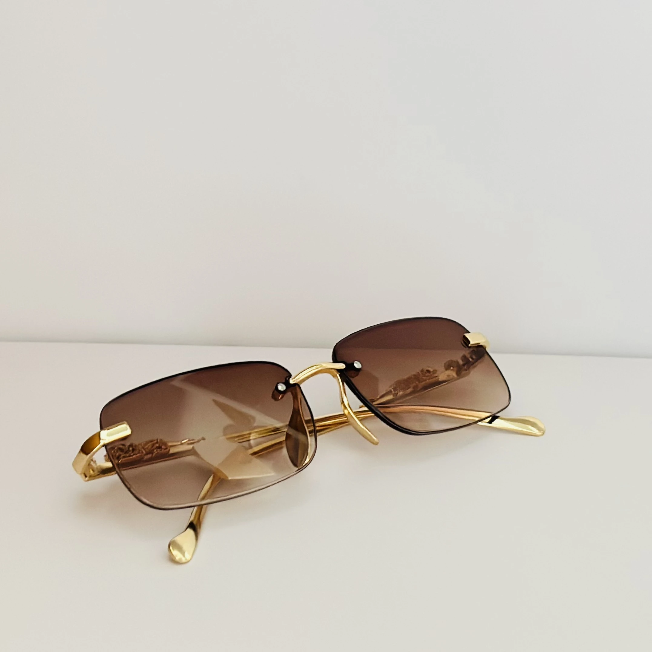 Rimless rectangular sunglasses
