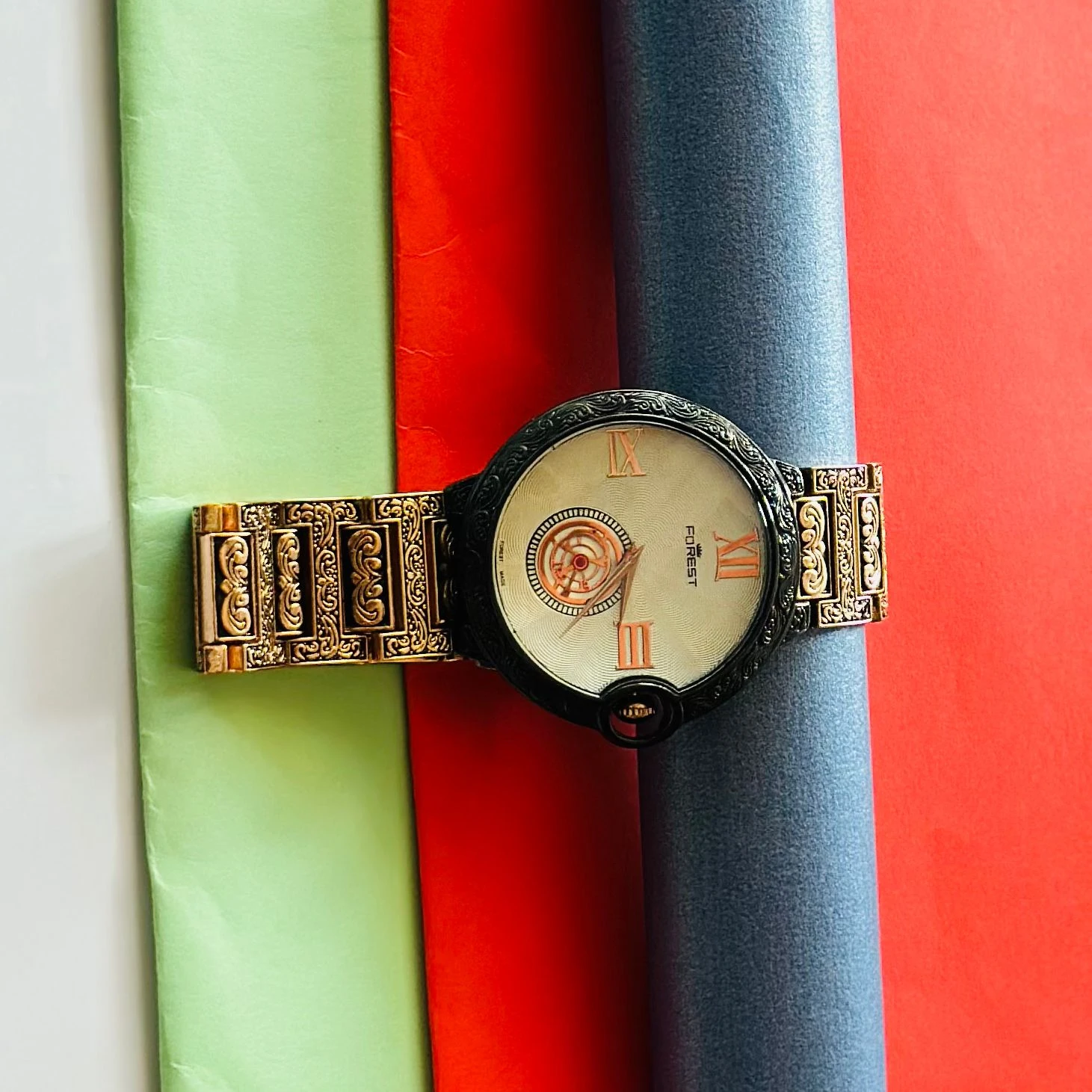 Forest Quartz Date watch with a gold-tone metal band