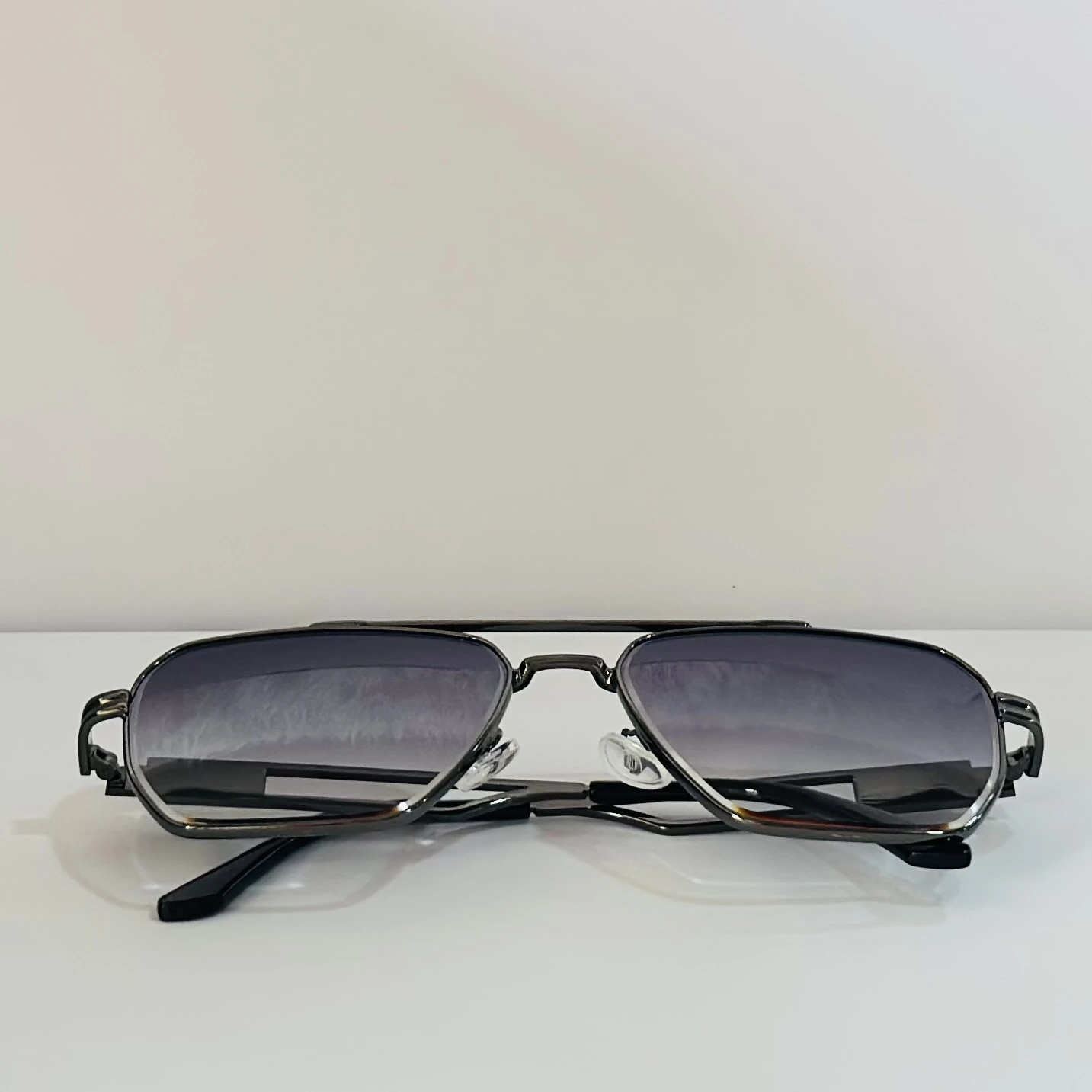 pair of Voyage unisex grey frame purple lens color wayfarer sunglasses.