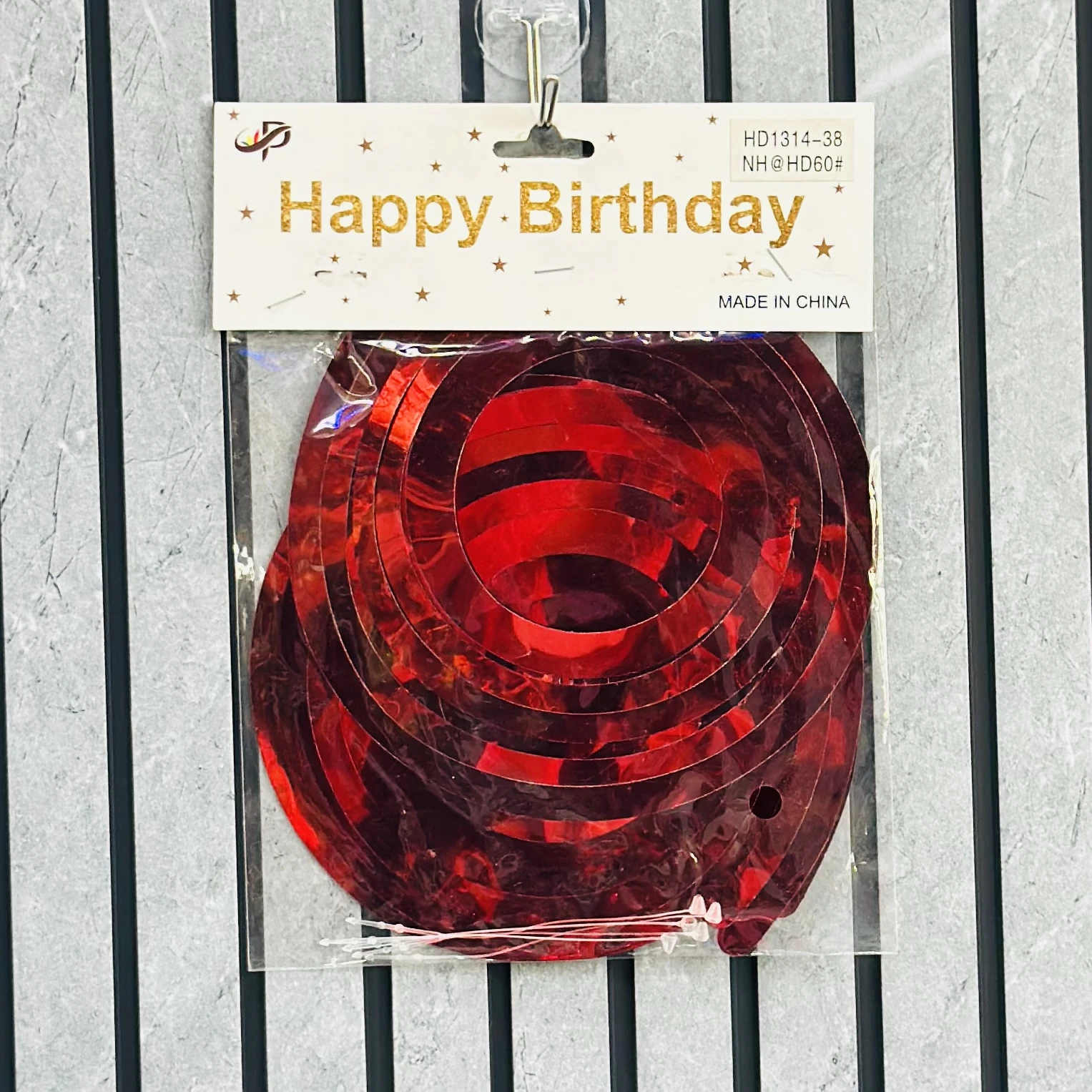 Set  of red metallic hanging swirl decorations