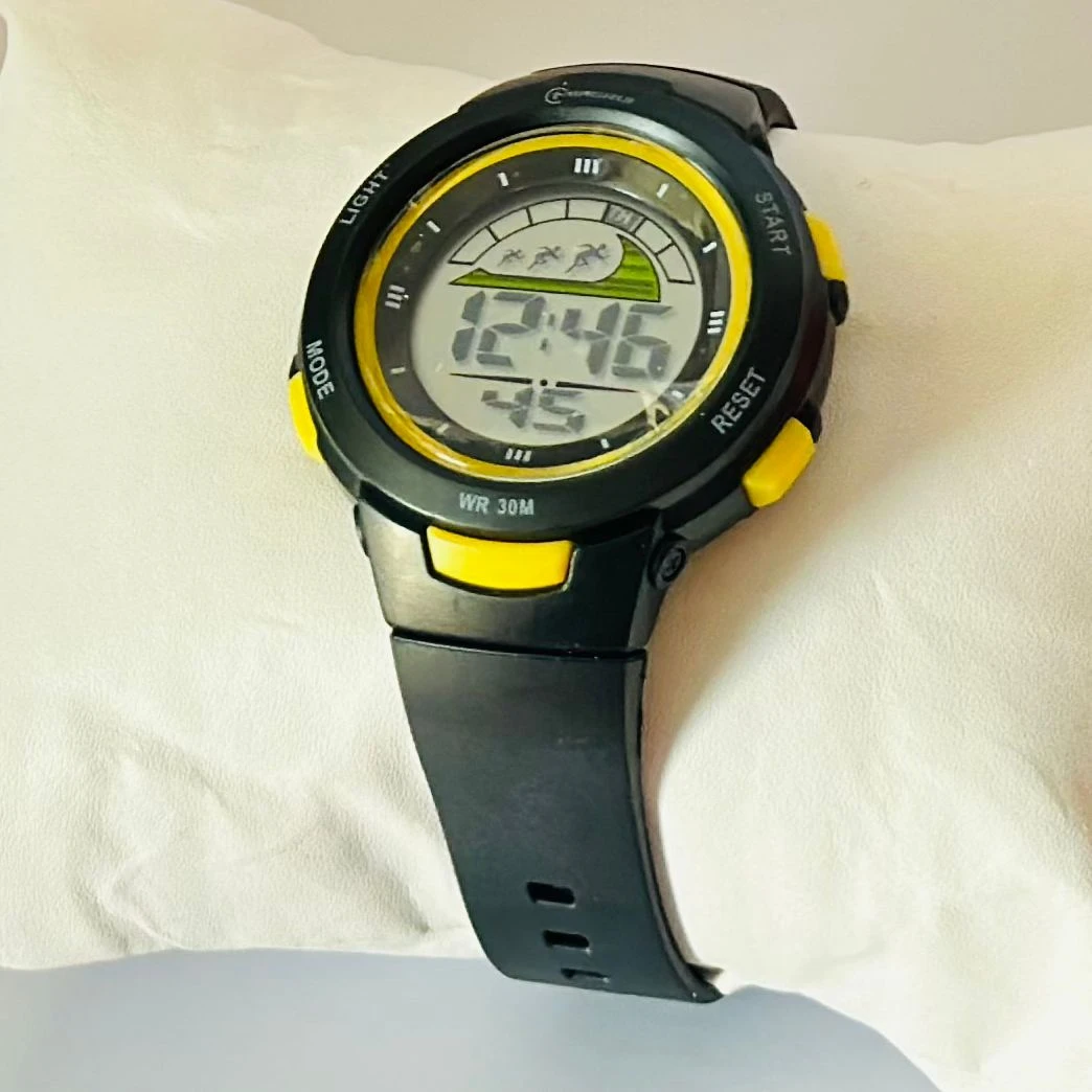 black Mingrui digital sports watch with a plastic or rubber strap.