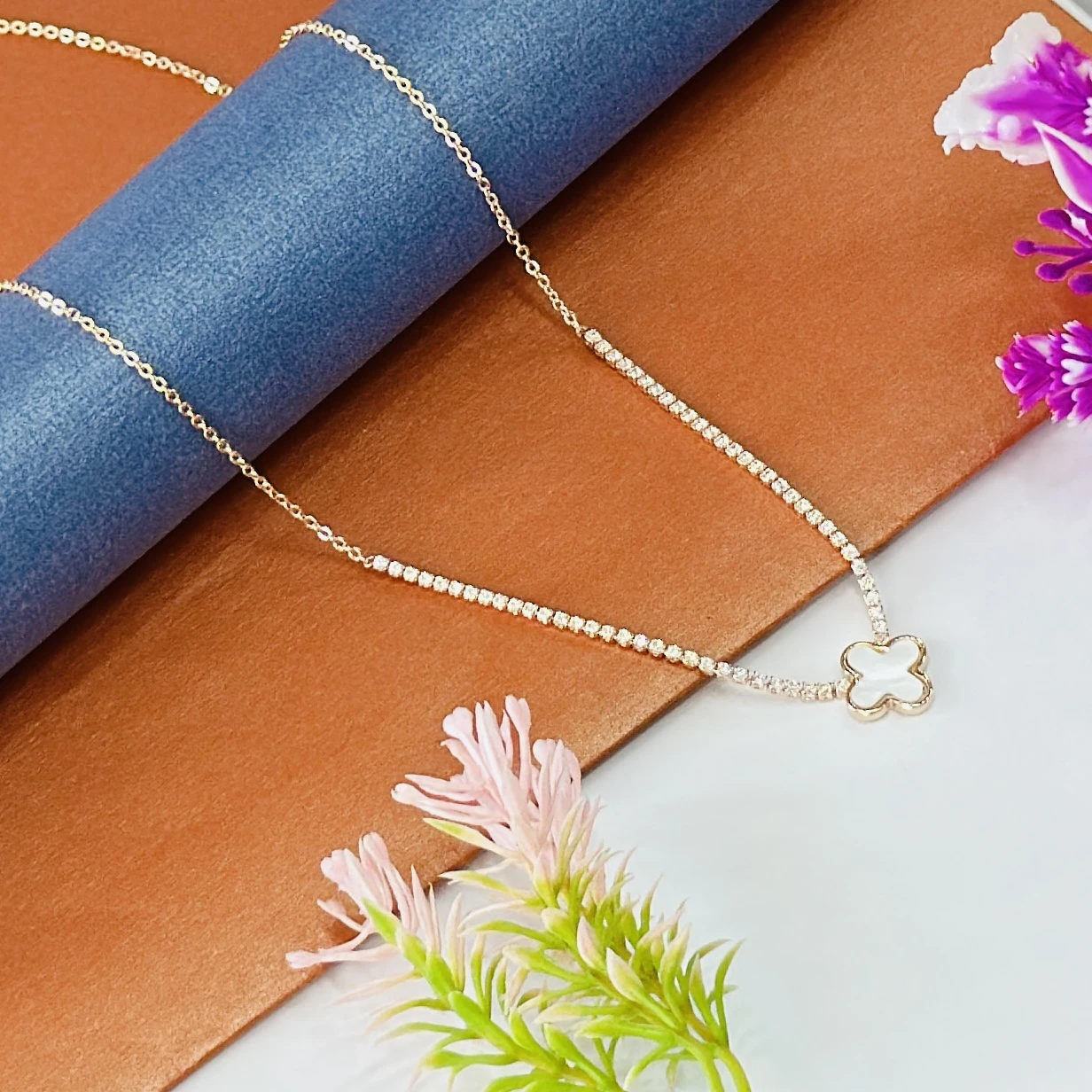 Gold plated four-leaf clover pendant