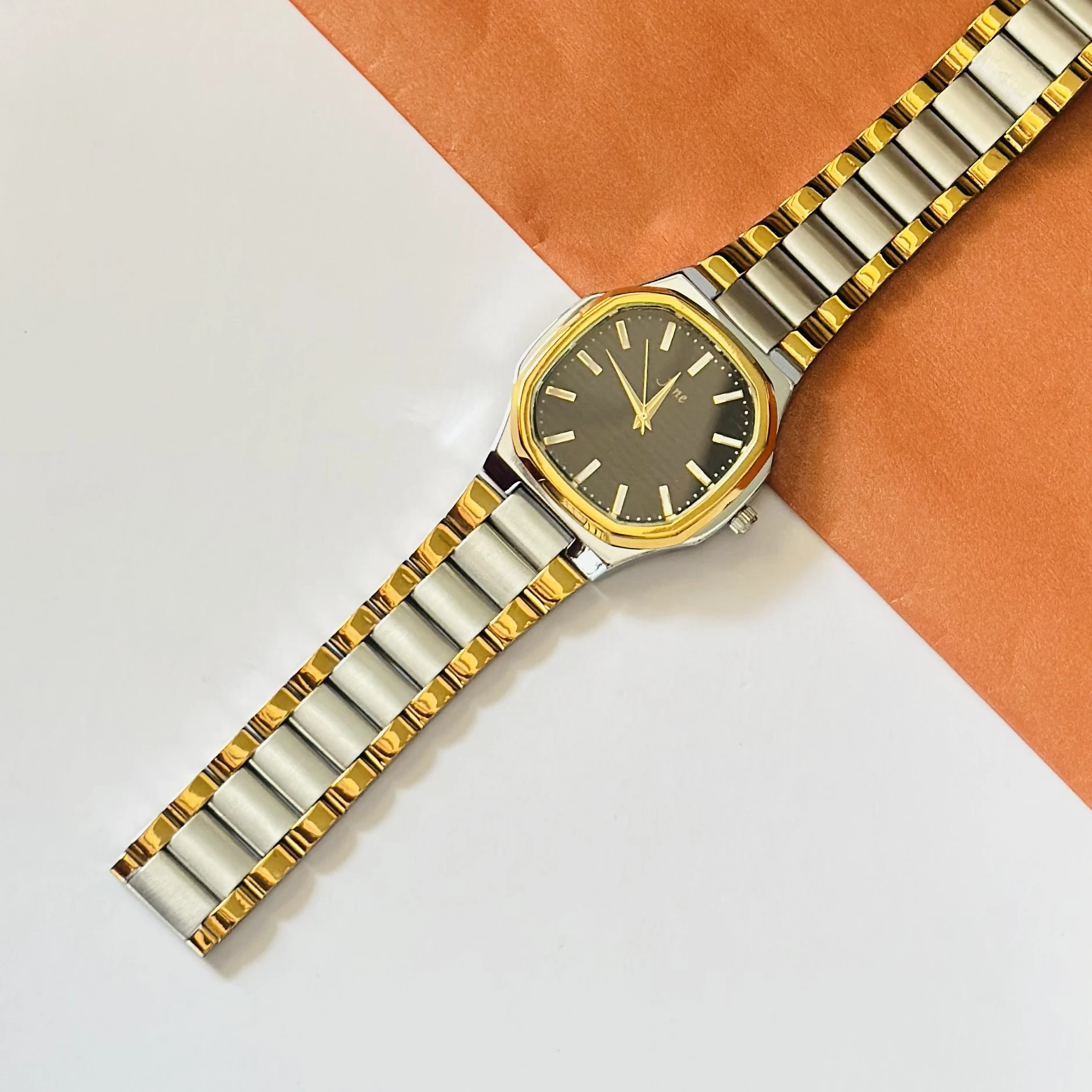 Two -tone stainless steel analog watch