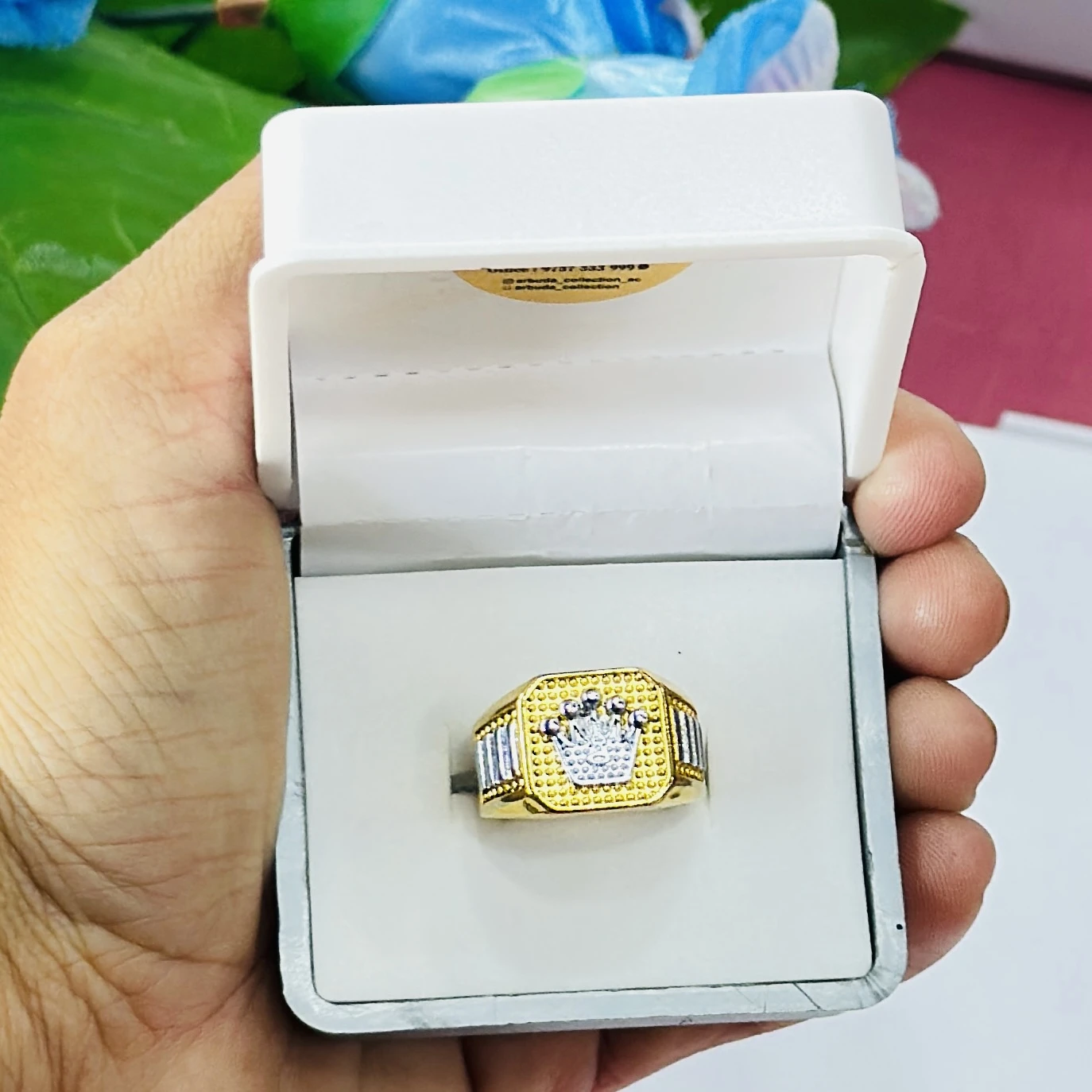 Gold toned men's crown ring