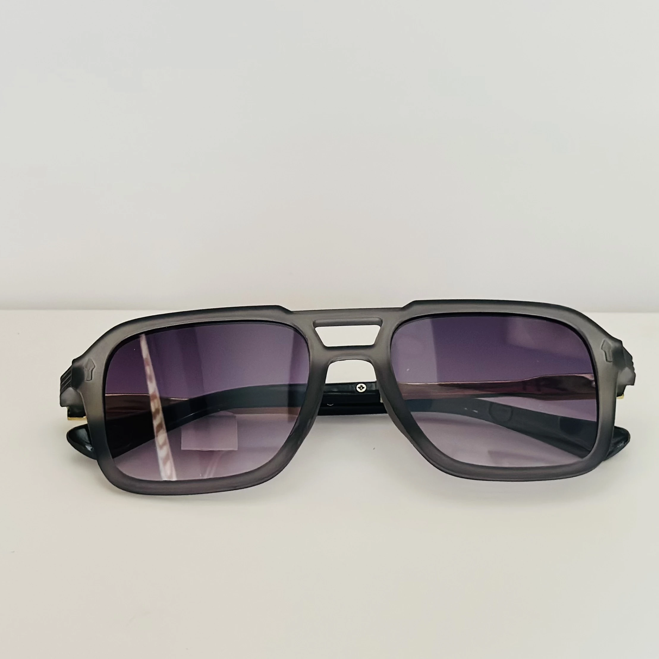 Cutler & Gross 1394 aviator sunglasses in a brown/cherry acetate frame.