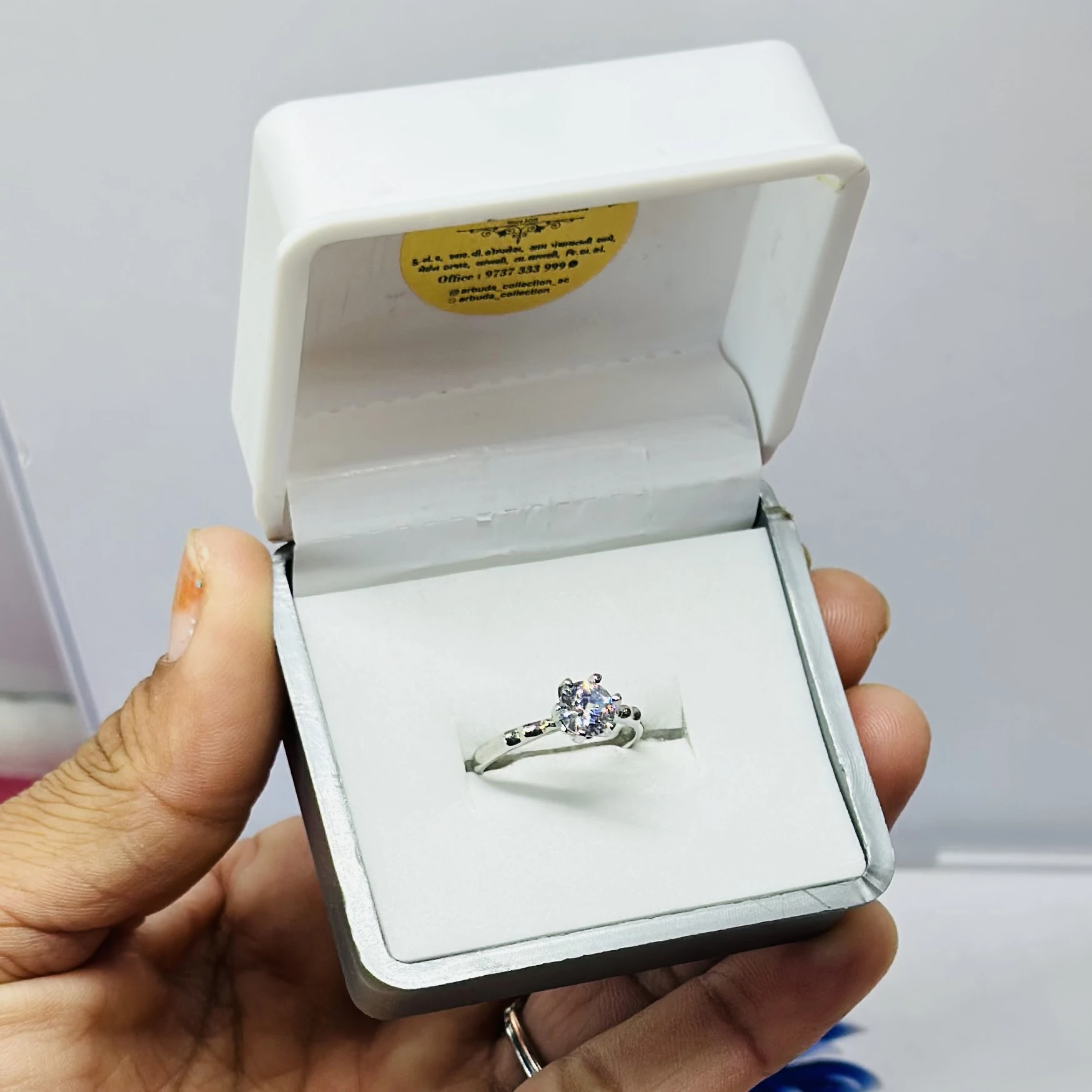 Silver solitaire engagement ring with American diamonds.