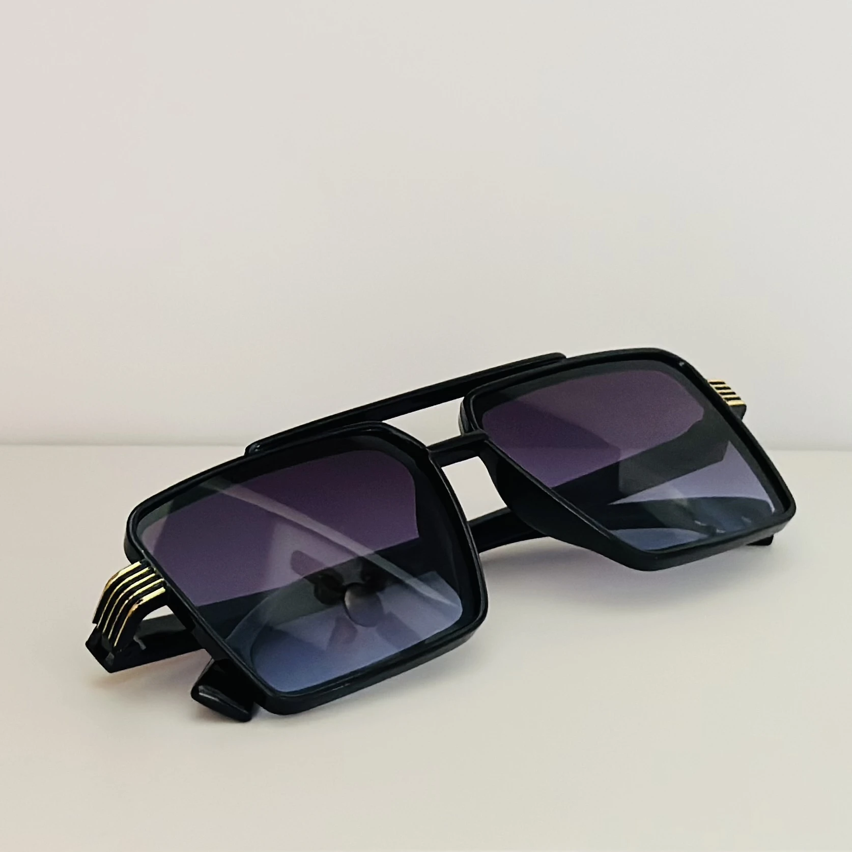 square sunglasses with a black frame