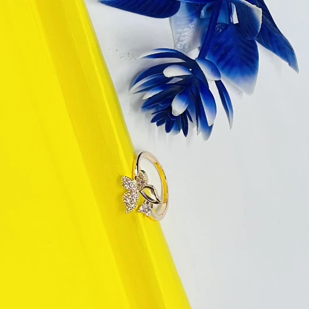 An adjustable rose gold-plated butterfly ring