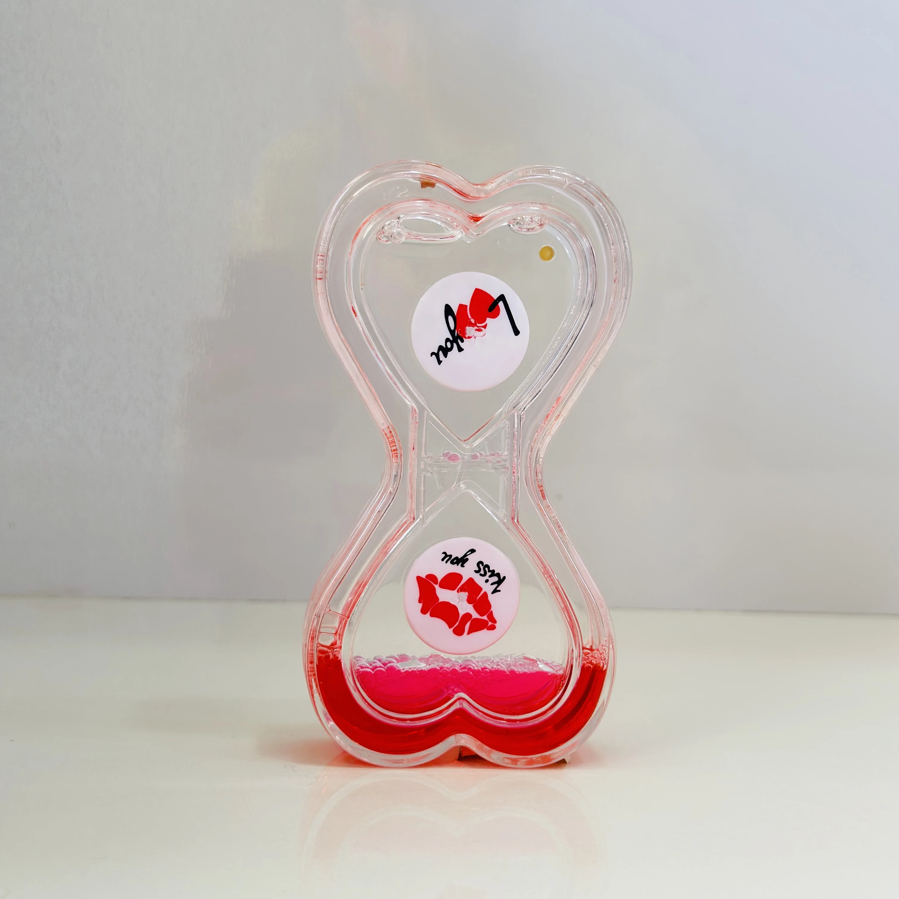 Decorative liquid hourglass(SKU-B7D4C9)