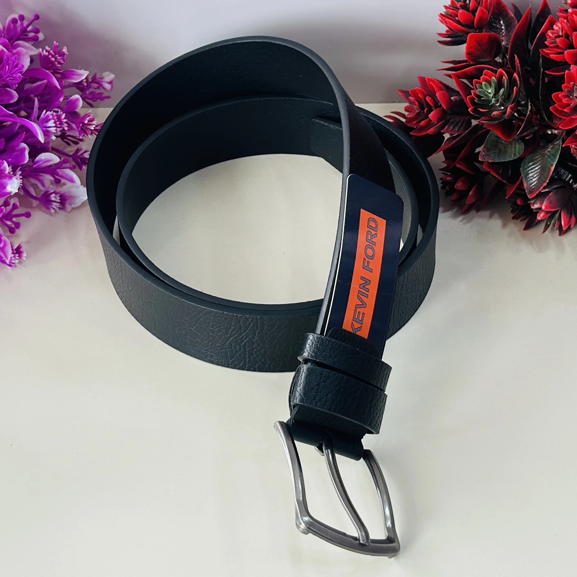 Black "Kevin Ford" brand men's belt.