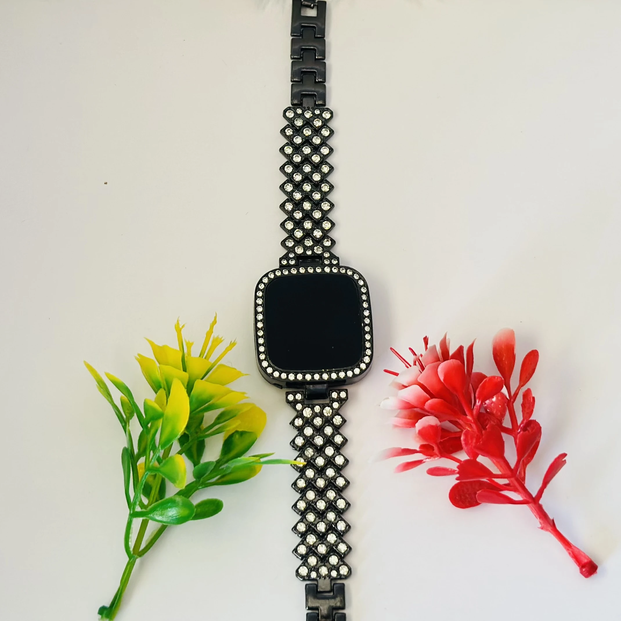 Black LED digital watch with a rhinestone bracelet.