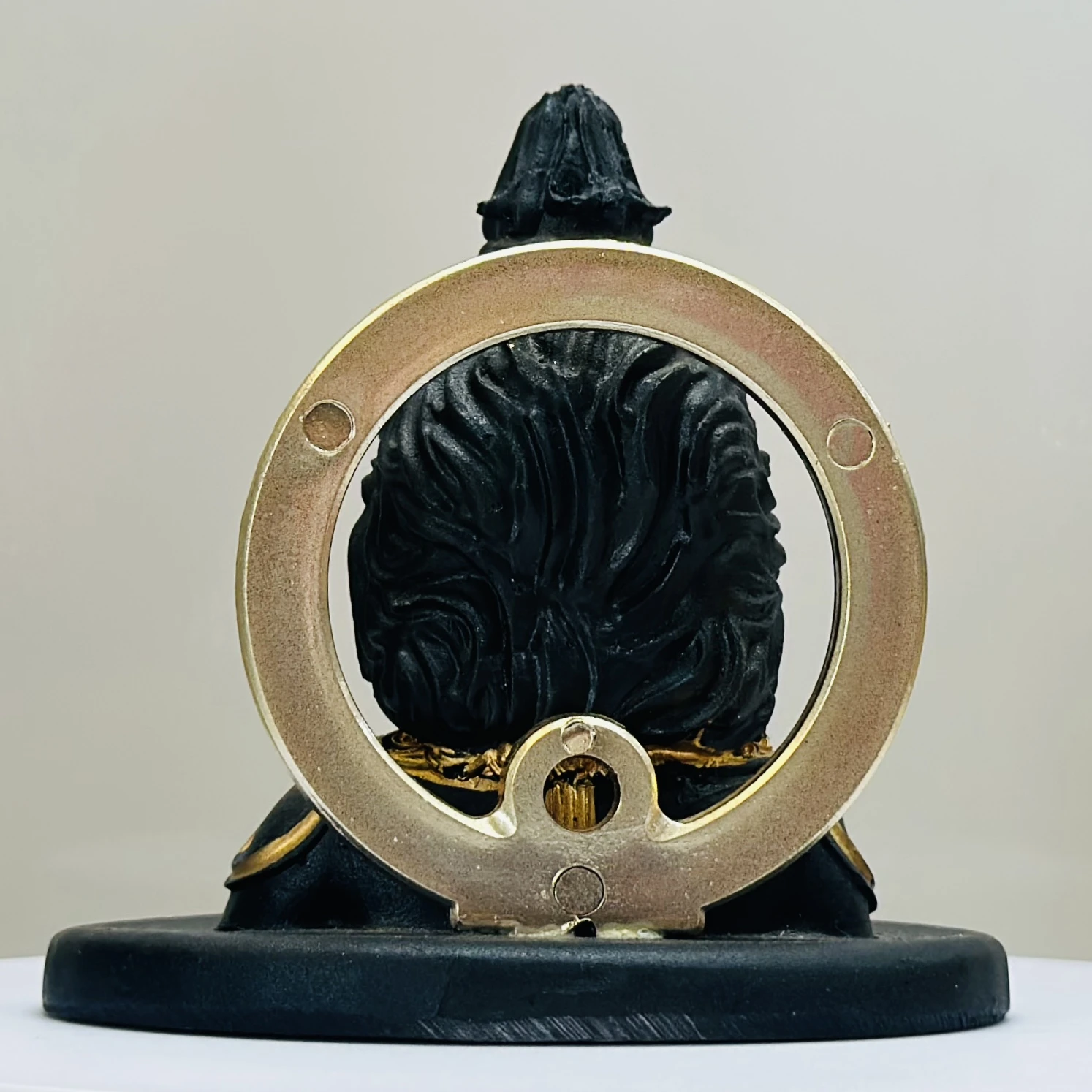 black resin idol of Ram Lalla (Lord Rama as a child).