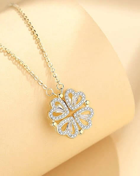 silver-toned, magnetic four-heart clover pendant necklace made of stainless steel