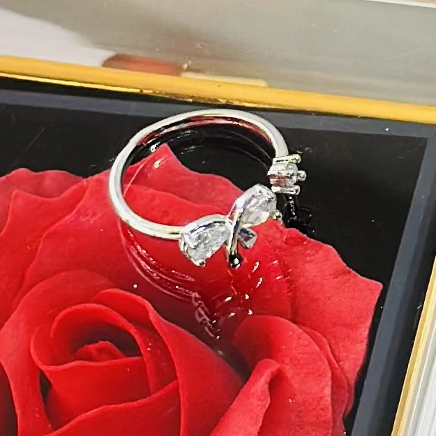 silver mini bow tie adjustable ring for women.