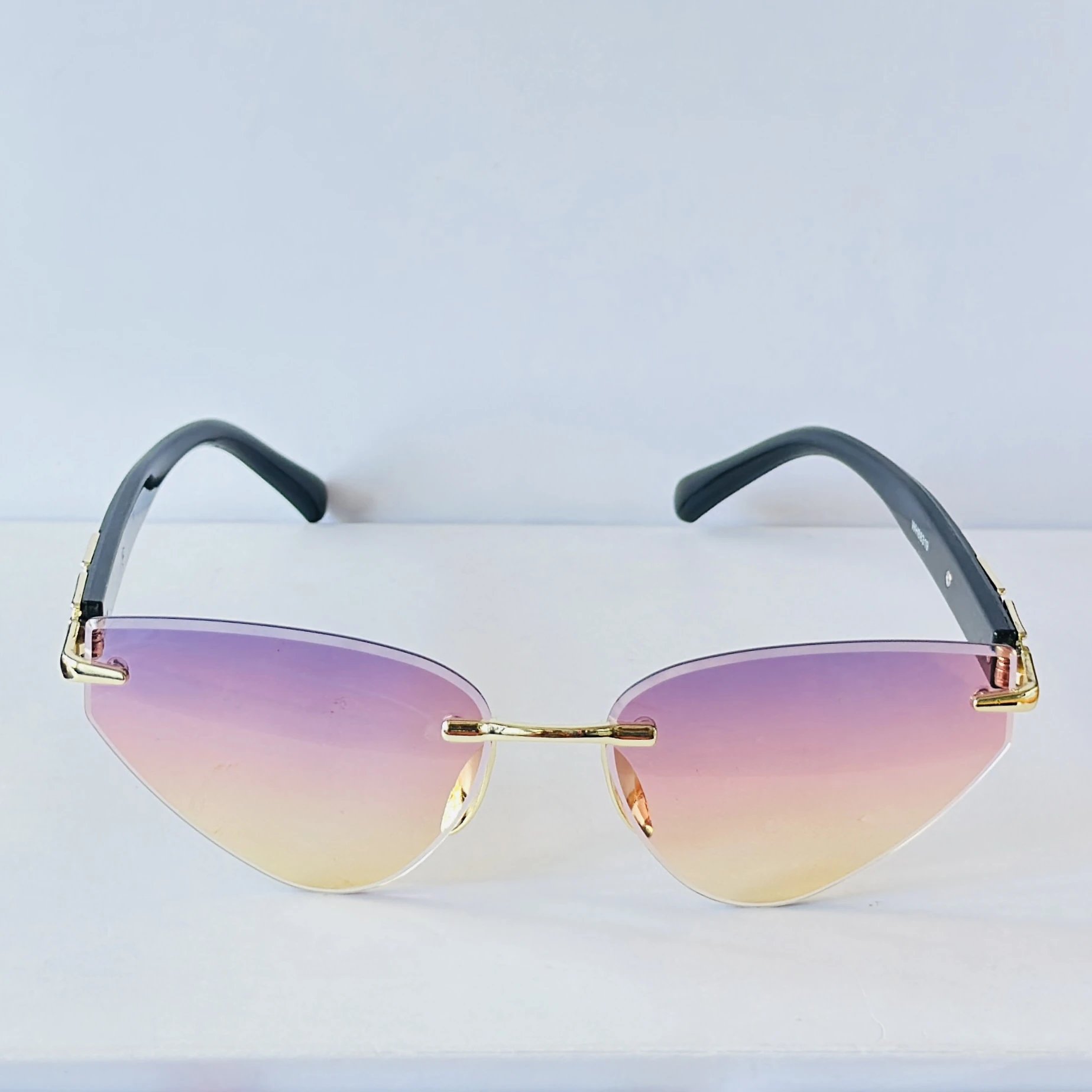 Rimless cat-eye sunglasses