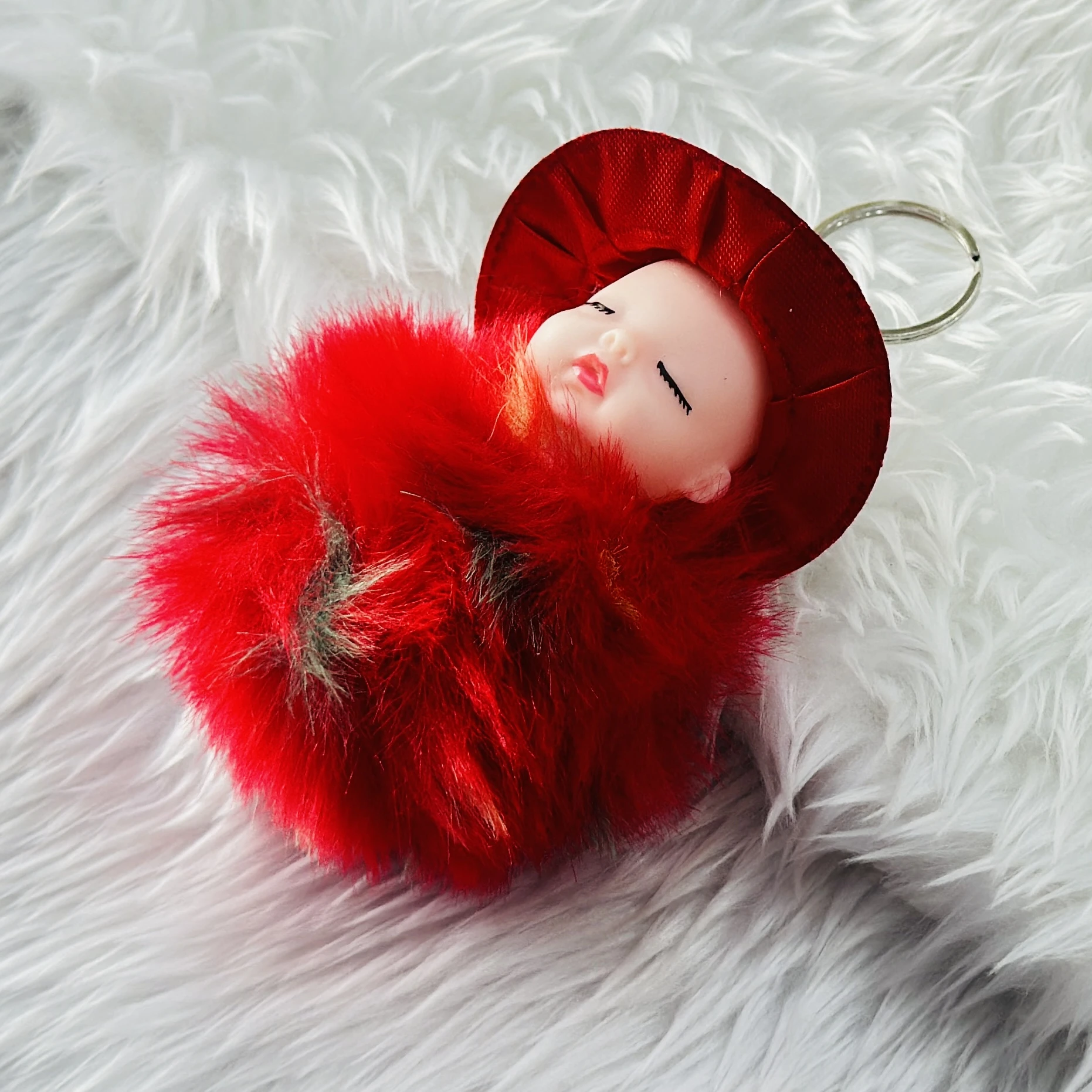 SRG Cute Sleeping Furry Baby doll with cap" keychain
