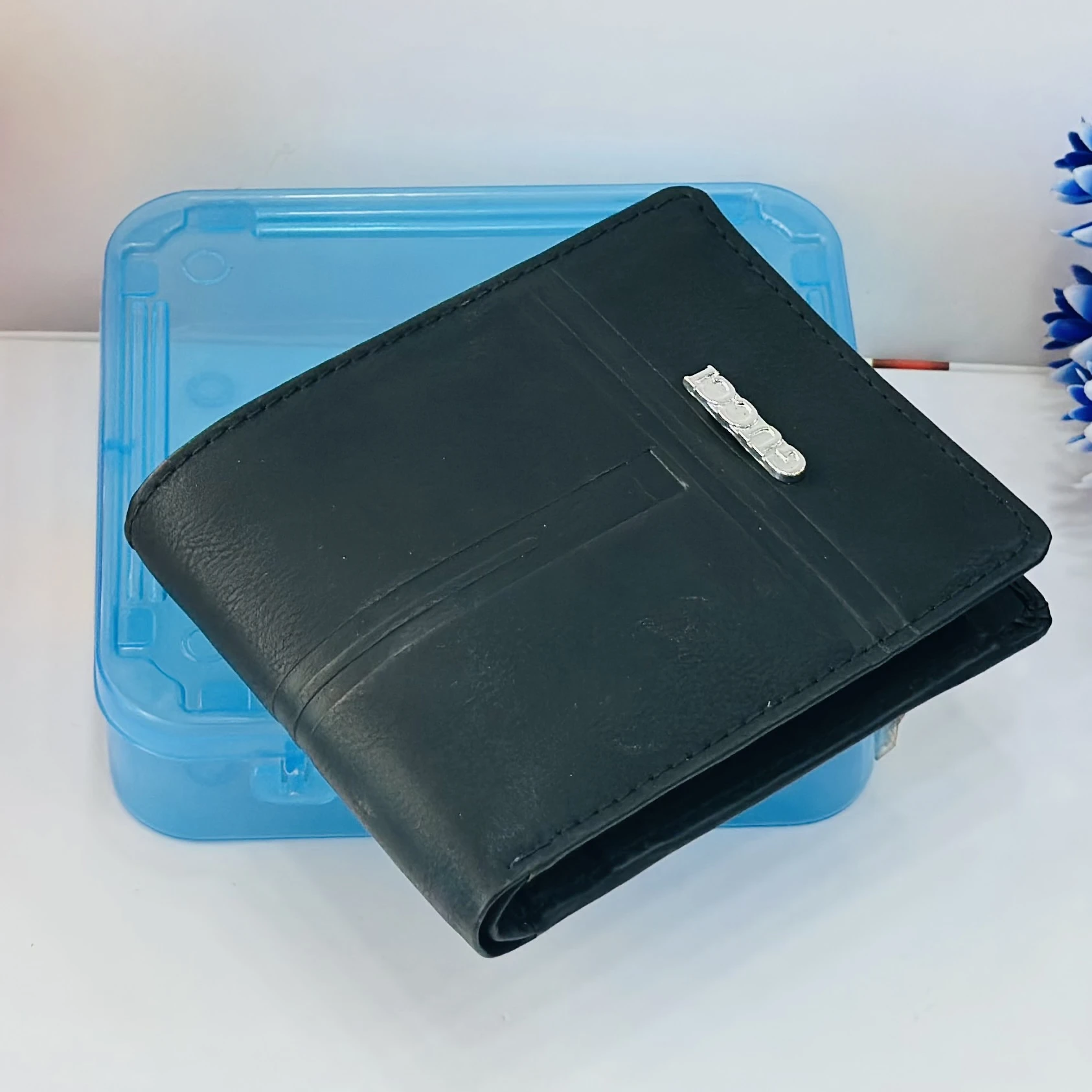 Black leather bi-fold men's wallet