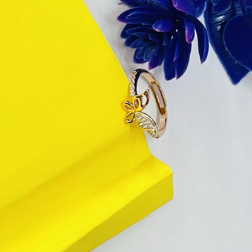 Gold plated alloy butterfly ring with a vintage style and clear stones.