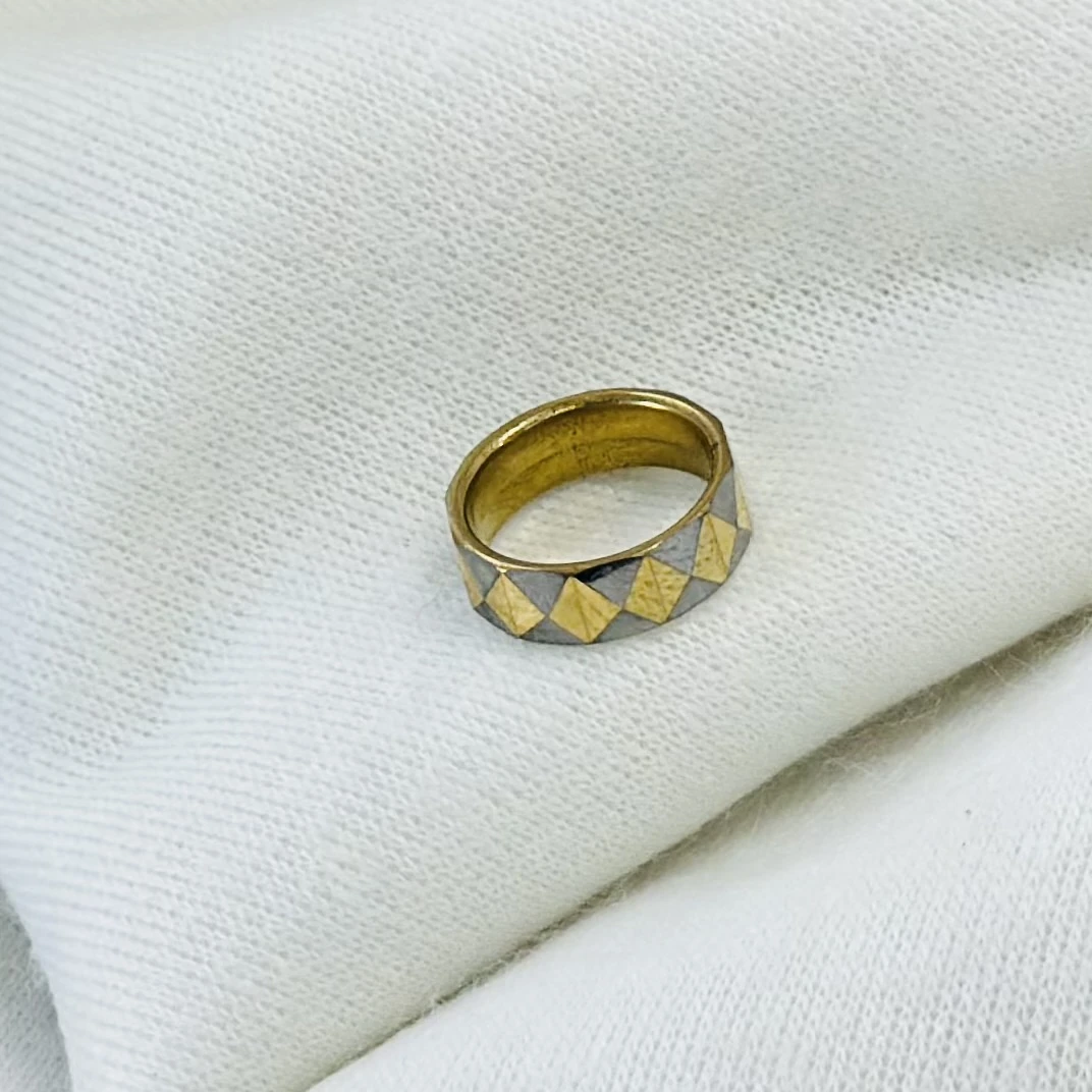 Tungsten carbide yellow faceted domed pyramid pattern wedding band ring.
