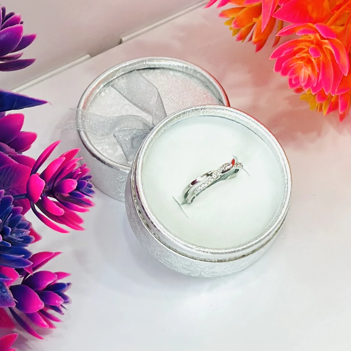 Silver intertwined couple's ring