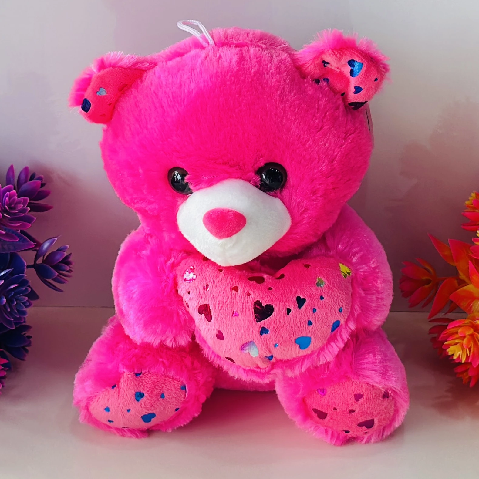 Bright pink plush teddy bear