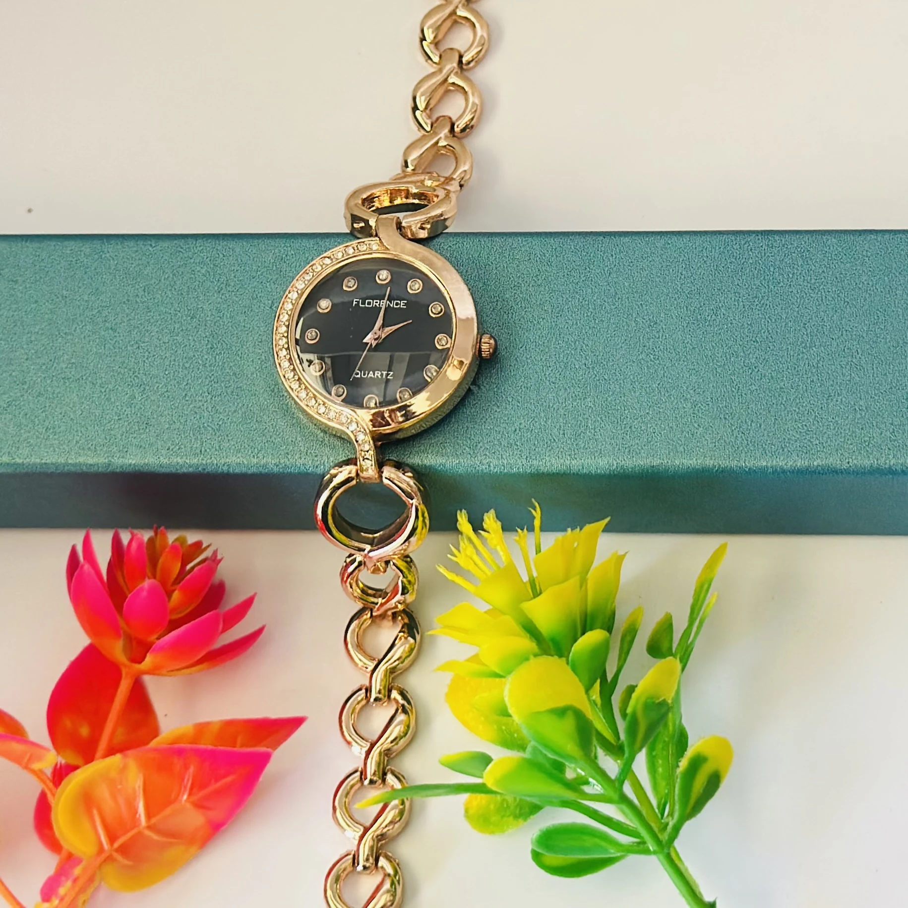 Women’s rose gold-tone quartz watch