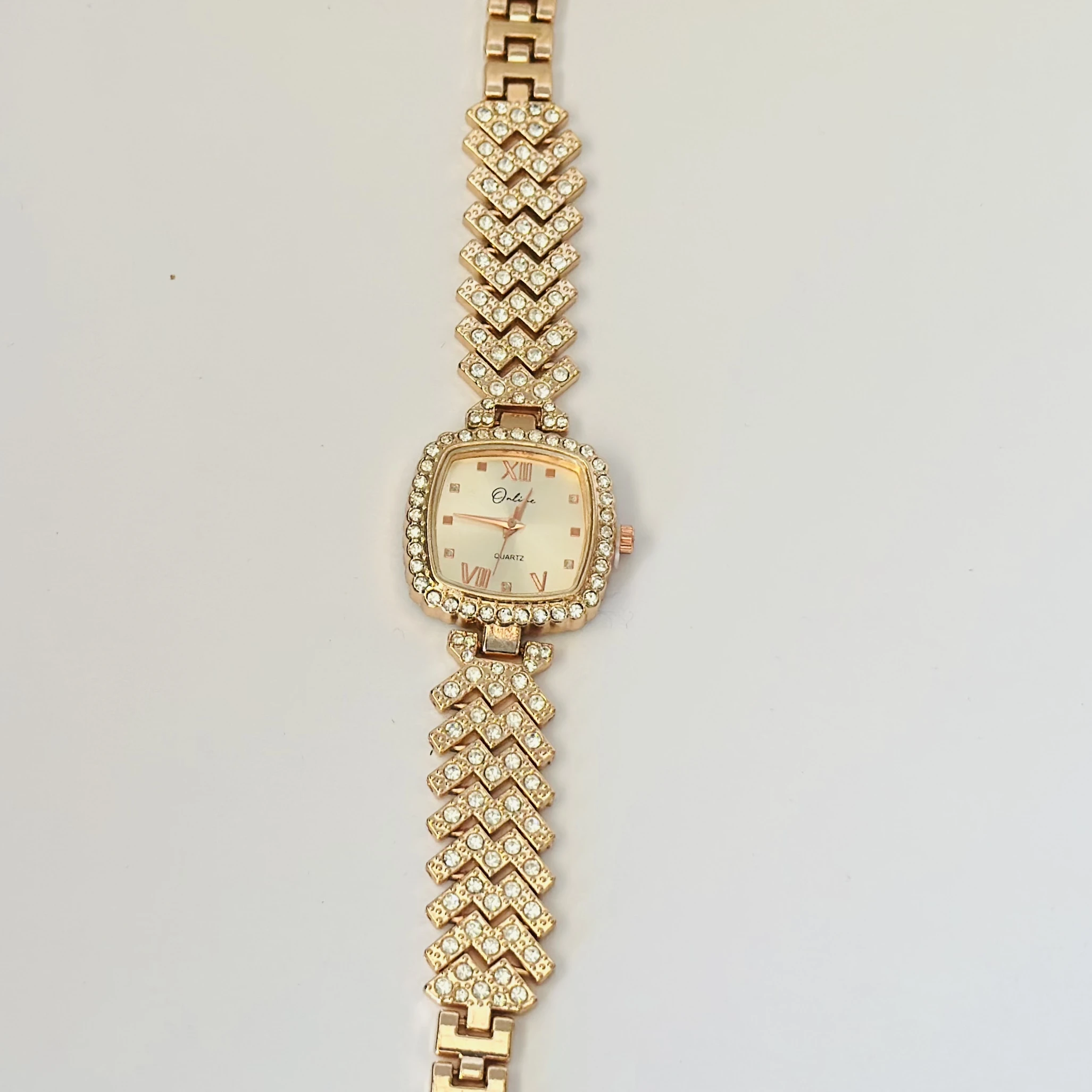 Rose gold analog watch