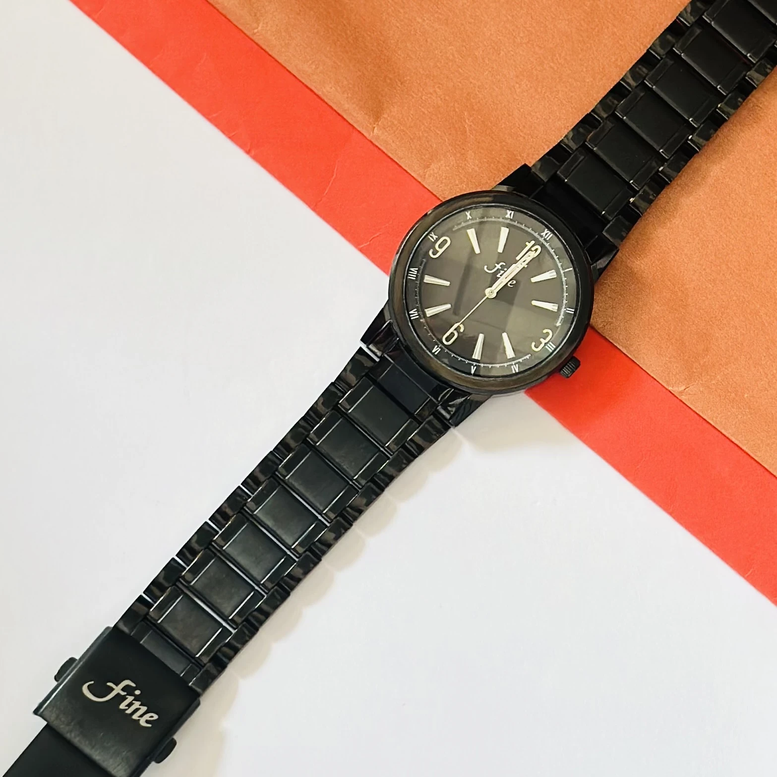 Black analog wristwatch