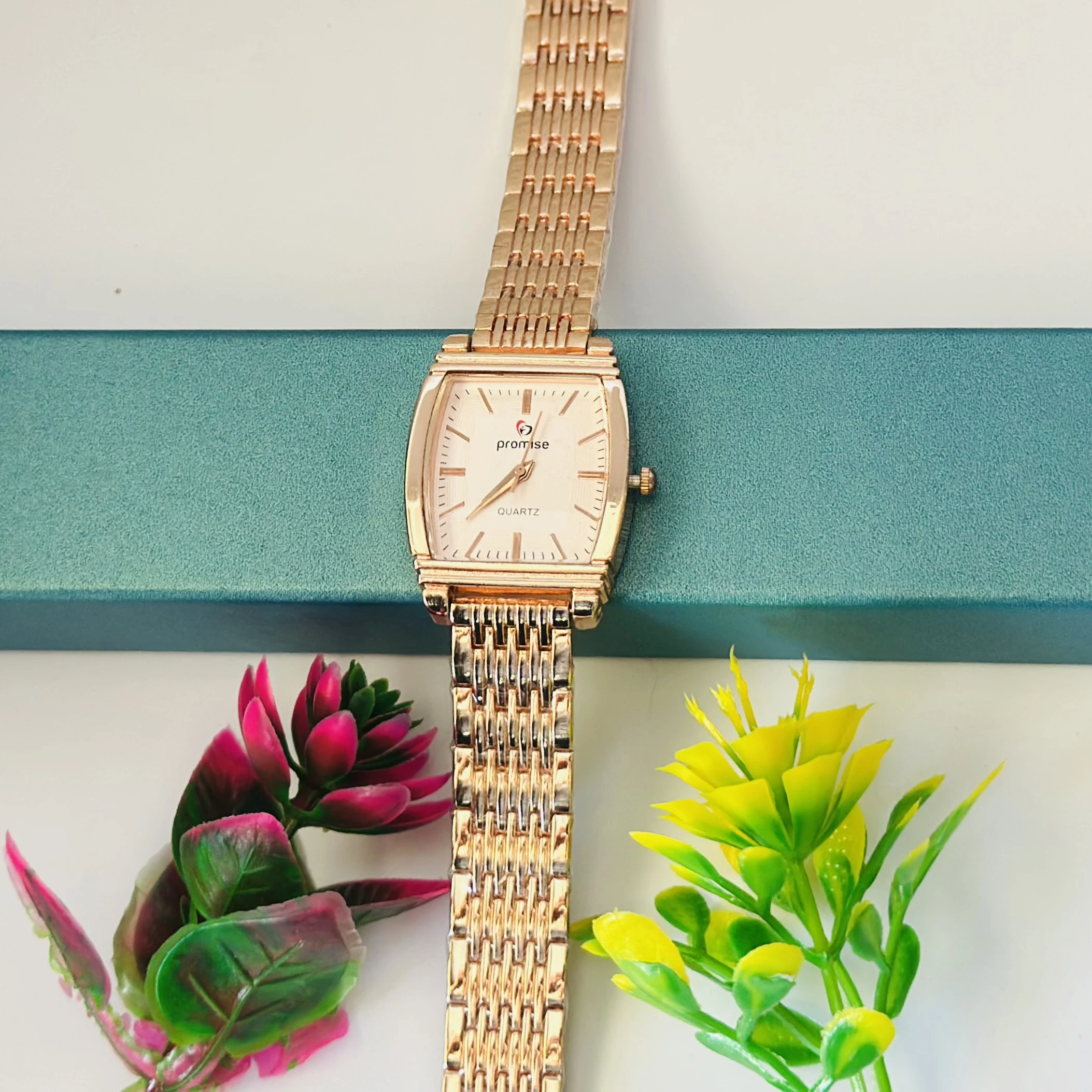 Rose gold analog watch