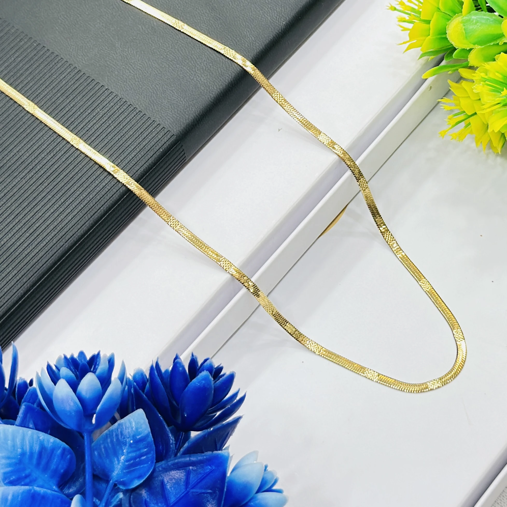 premium gold-plated herringbone snake chain.