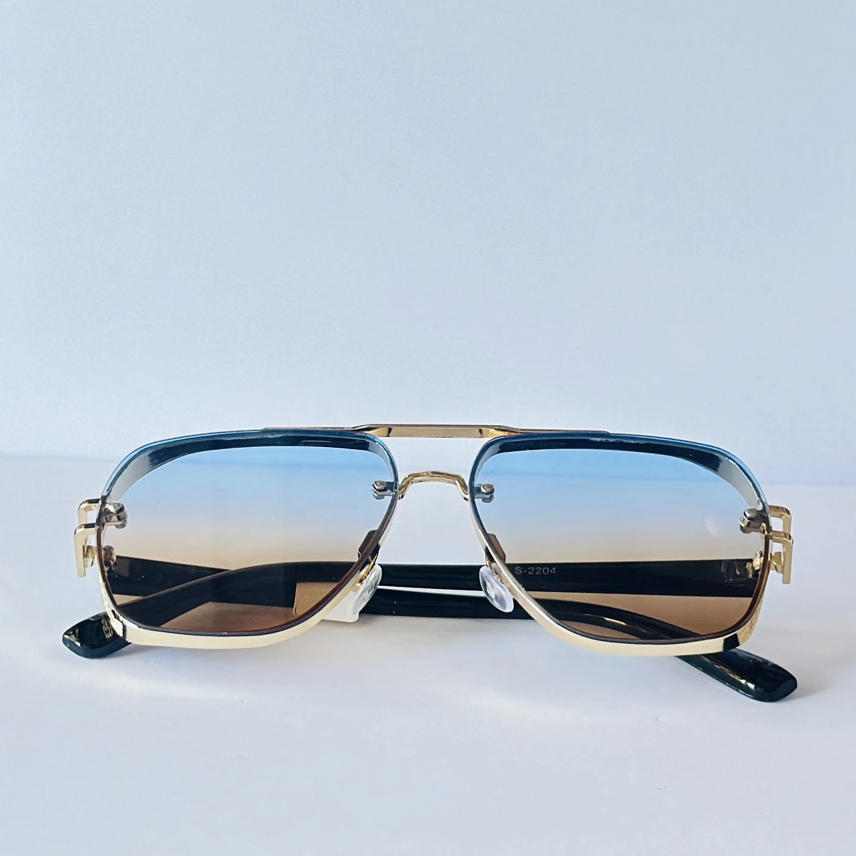 sunglasses appear to be the Maybach