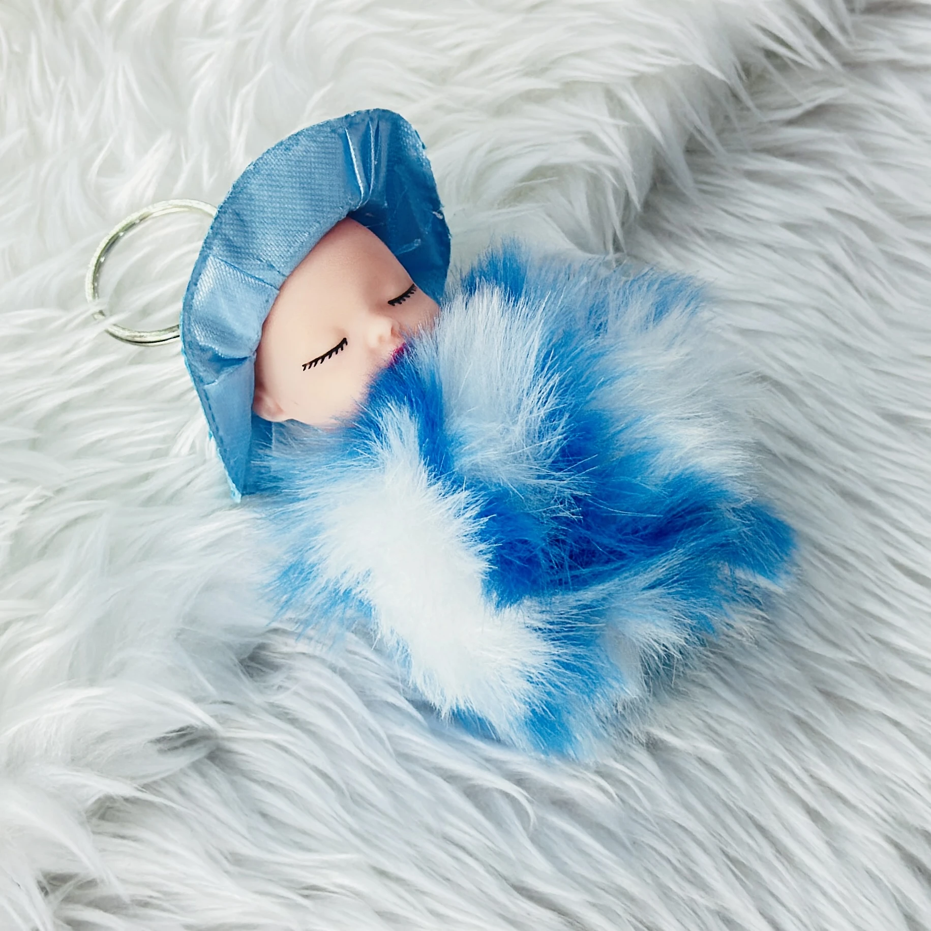 fluffy sleeping baby doll keychain