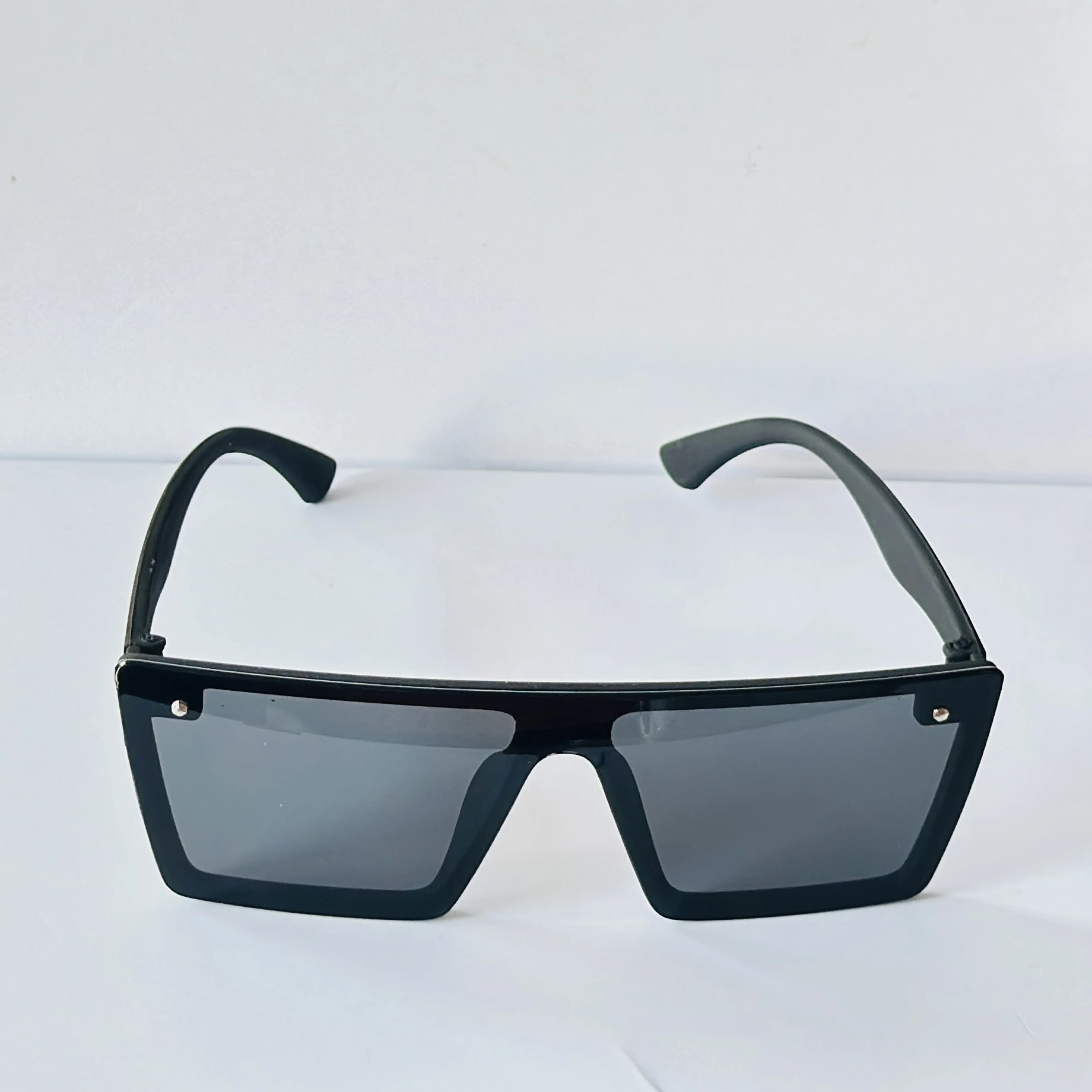 Black sunglasses are a retro square