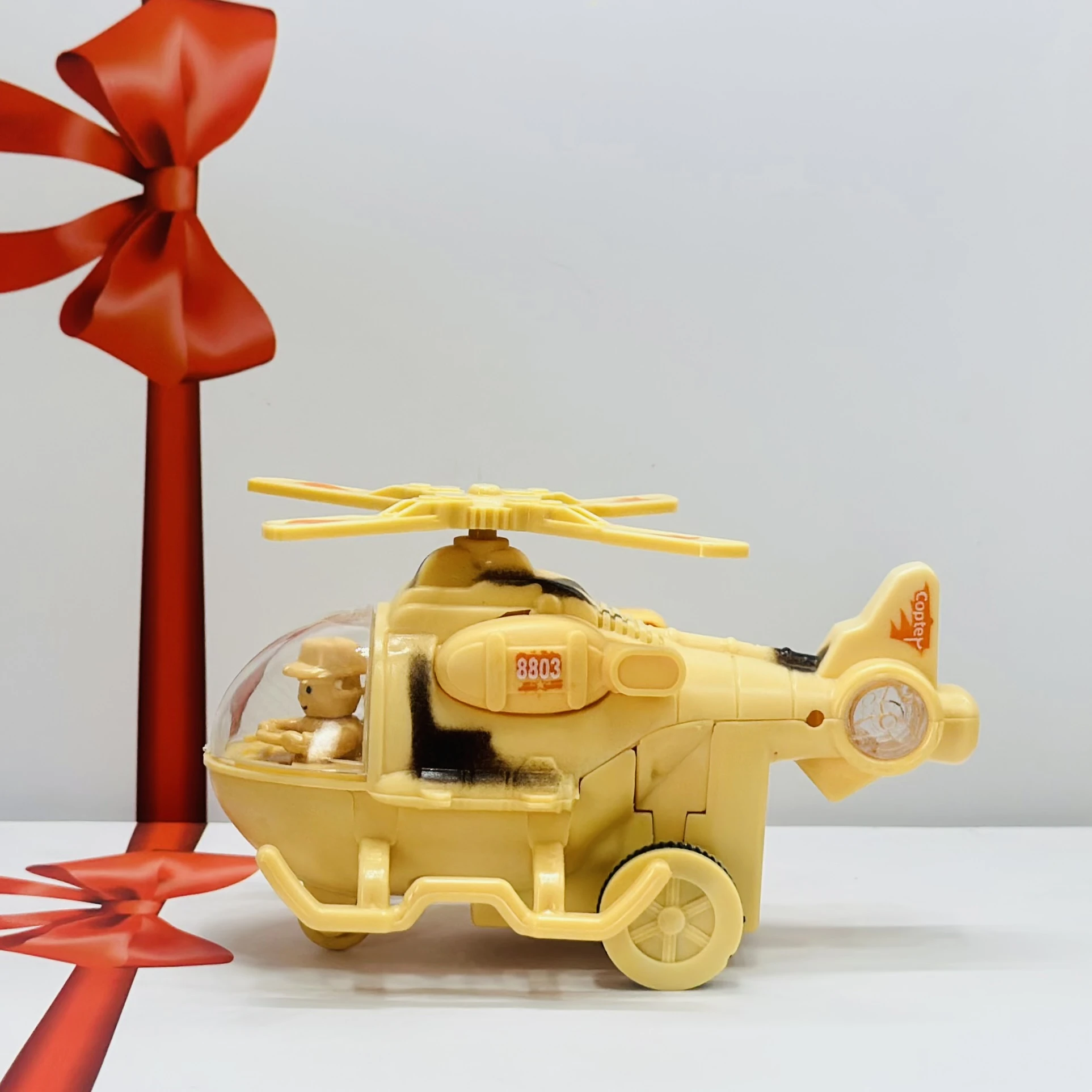 friction-powered toy helicopter