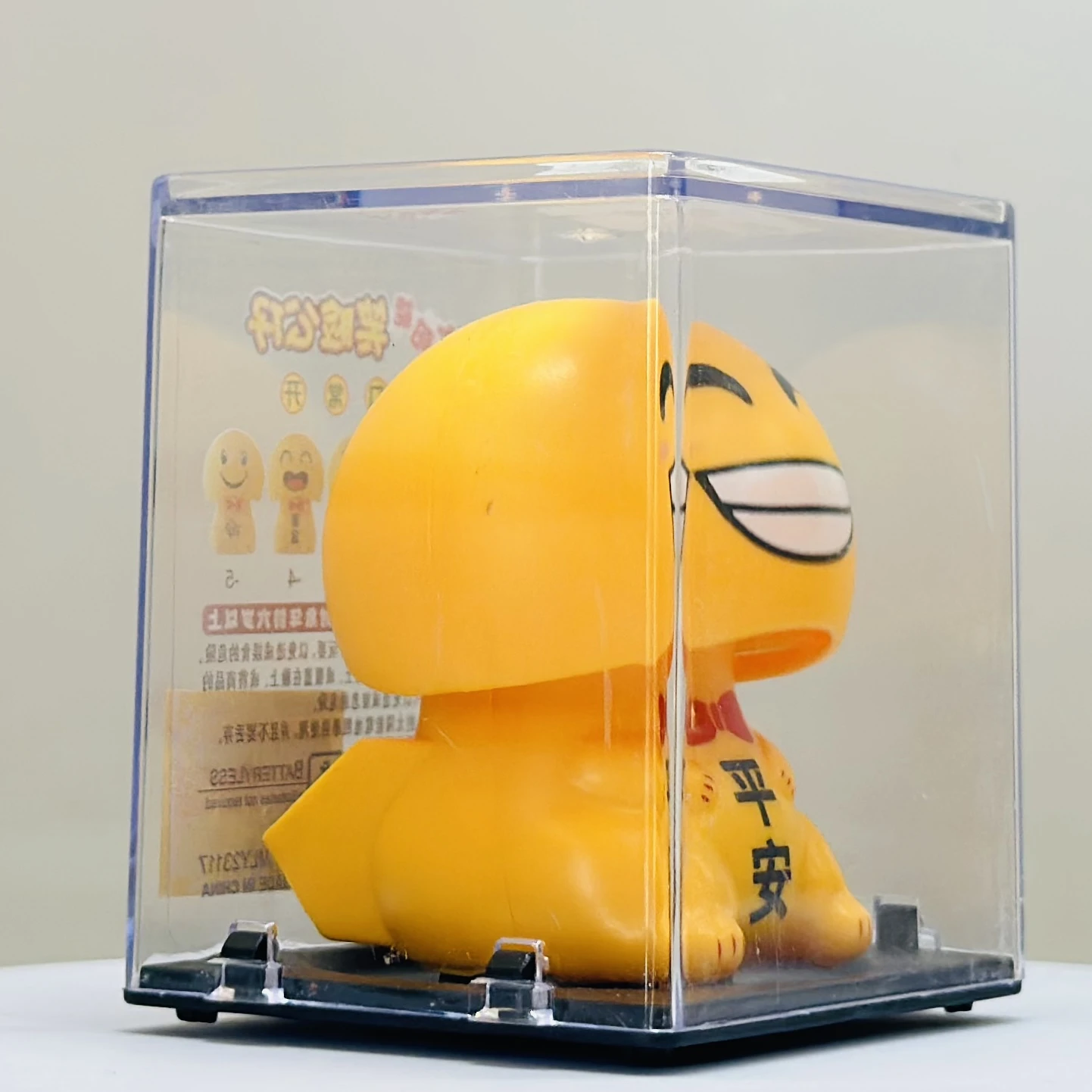 solar-powered smiley figurine