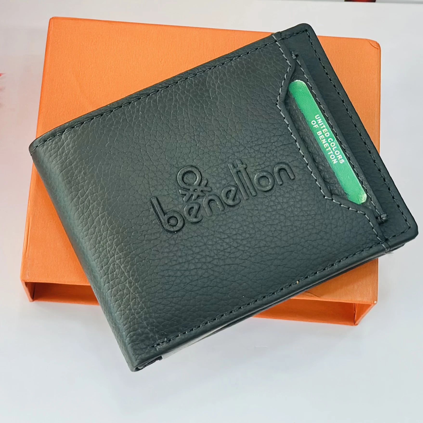 Black leather bi-fold wallet from United Colors of Benetton.
