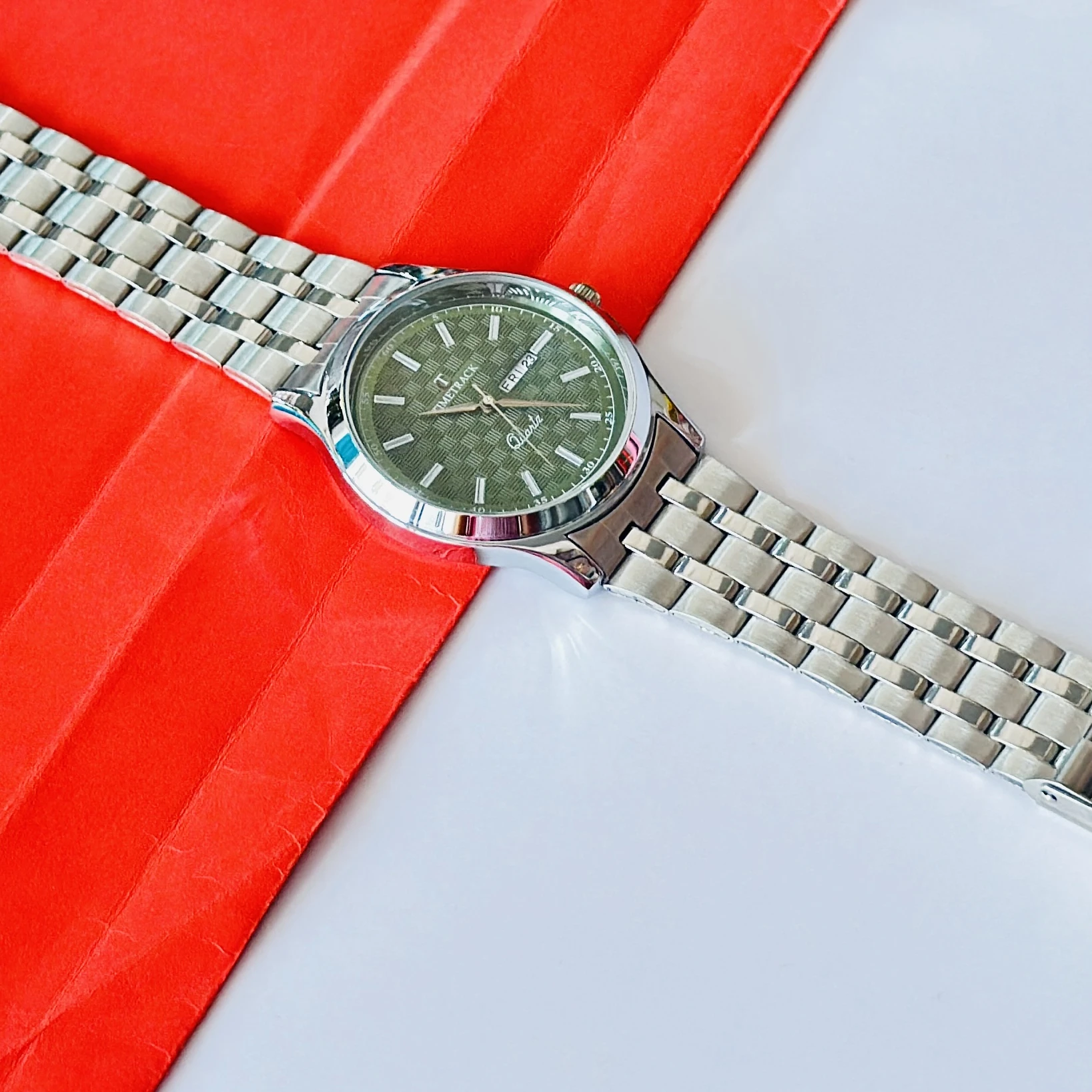 silver-toned stainless steel analogue watch