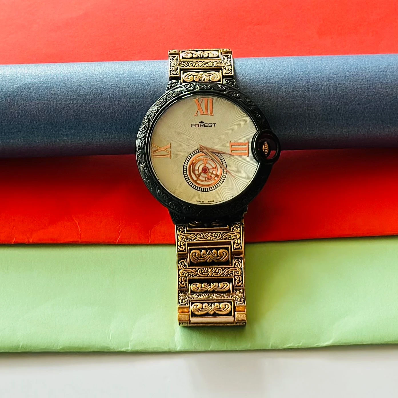 Forest Quartz Date watch with a gold-tone metal band