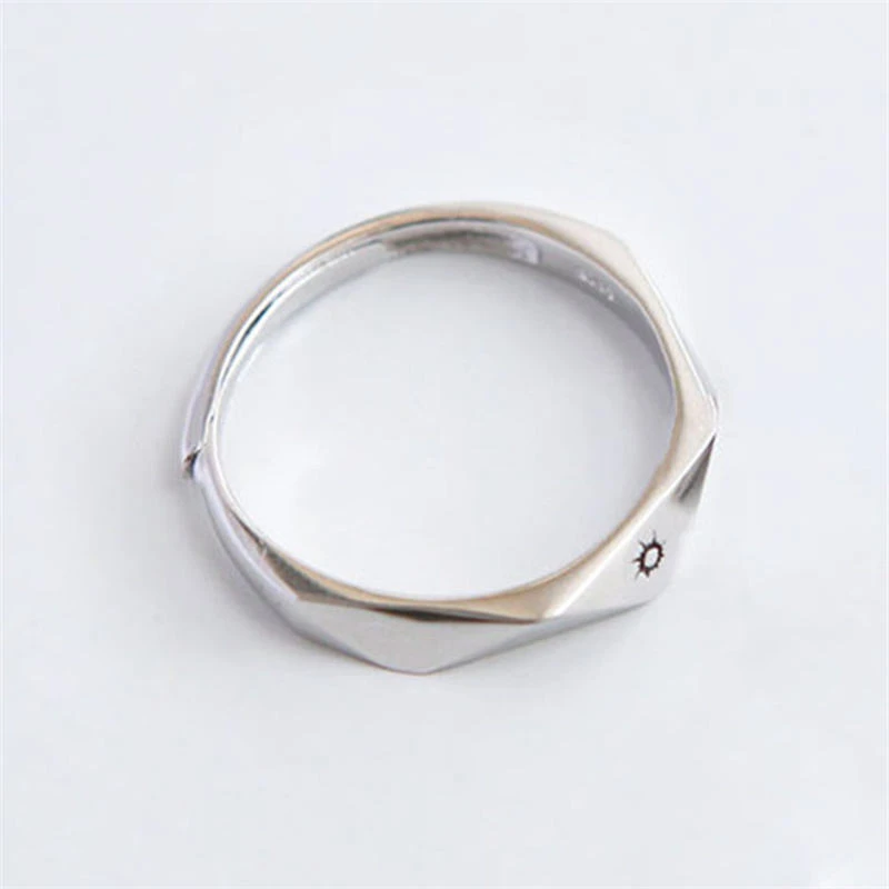Set of silver-toned couple rings