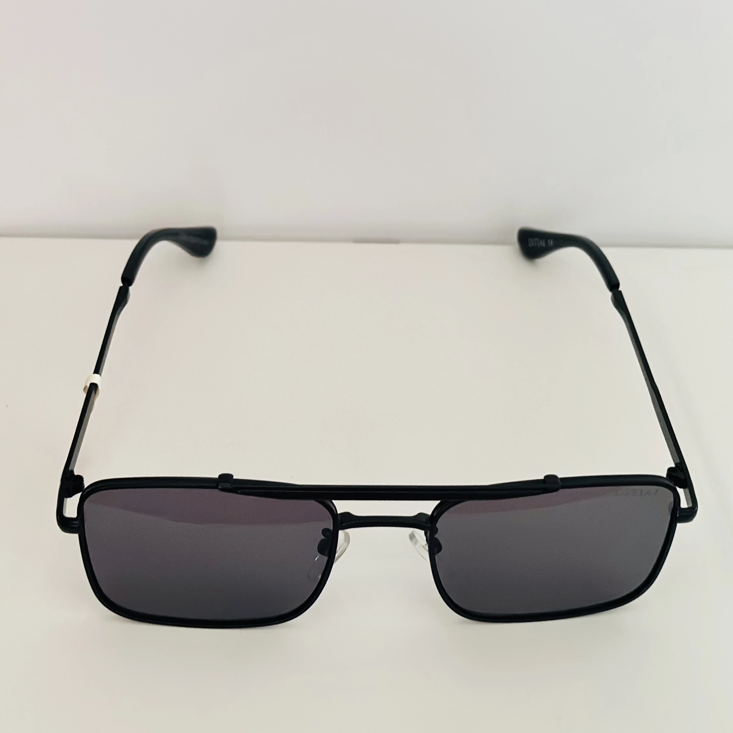 Guess GU00060 sunglasses in matte black with grey lenses.