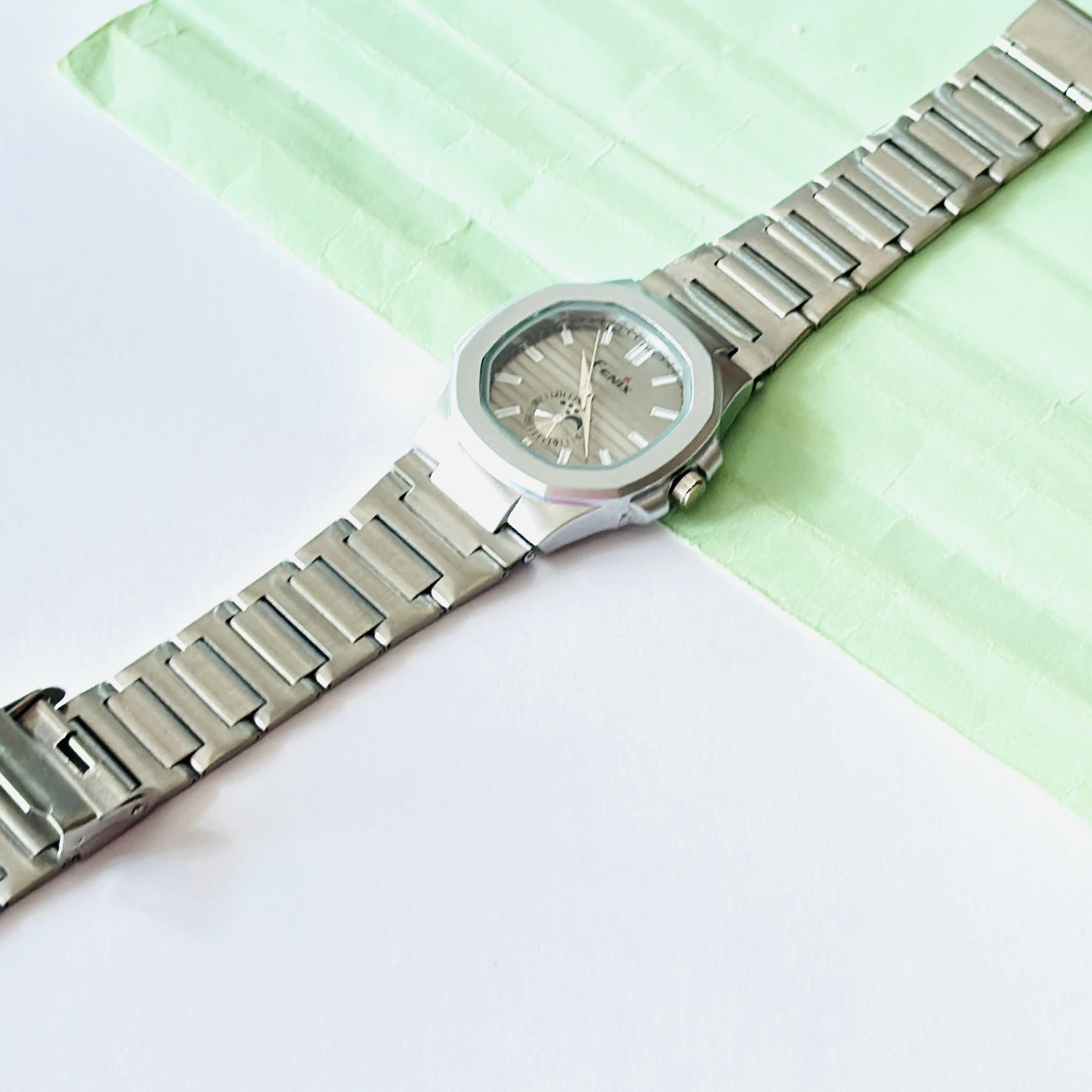 silver-toned stainless steel analogue watch
