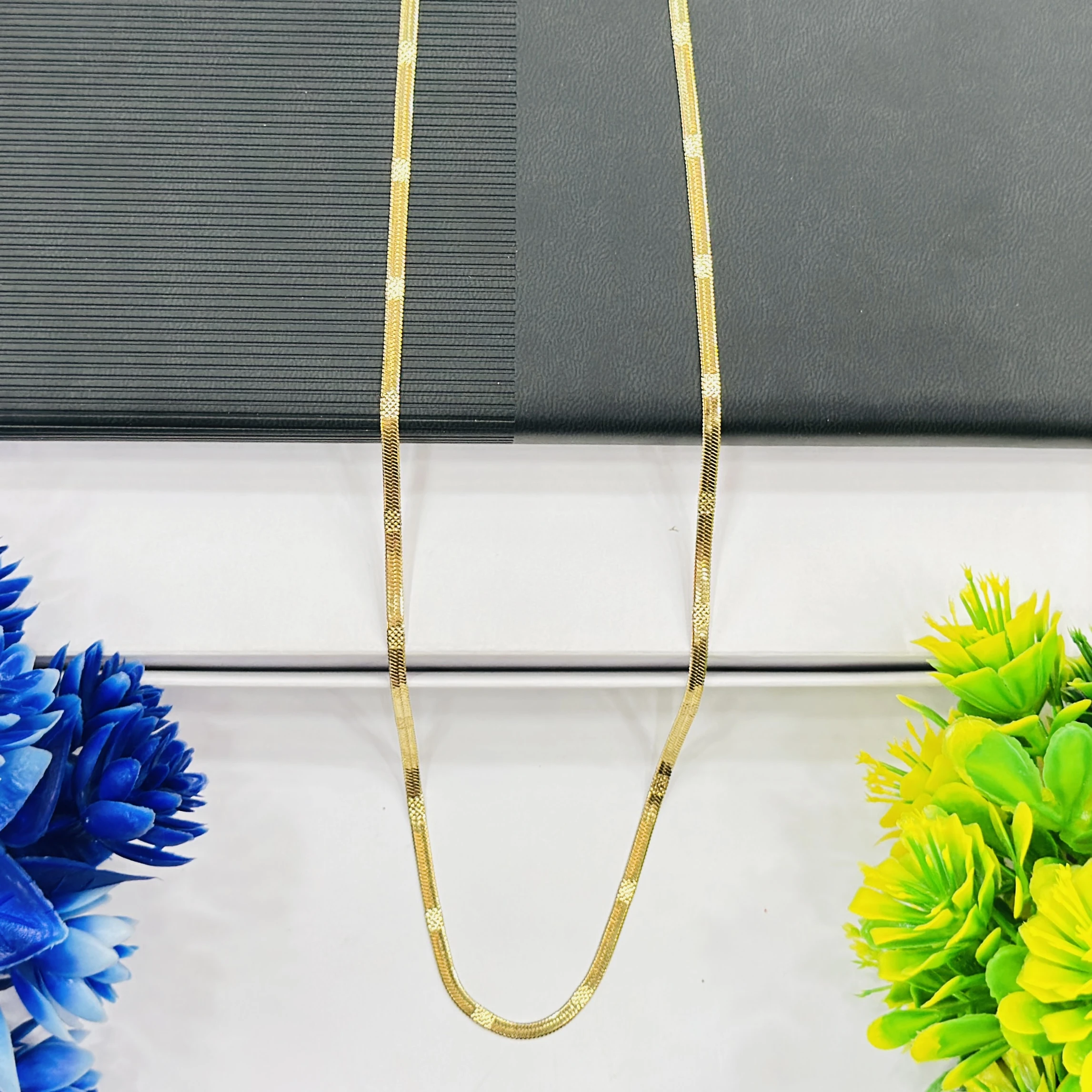 premium gold-plated herringbone snake chain.