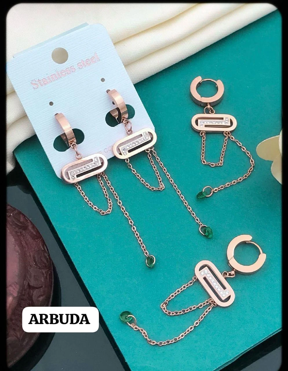 Rose gold and diamond drop earrings