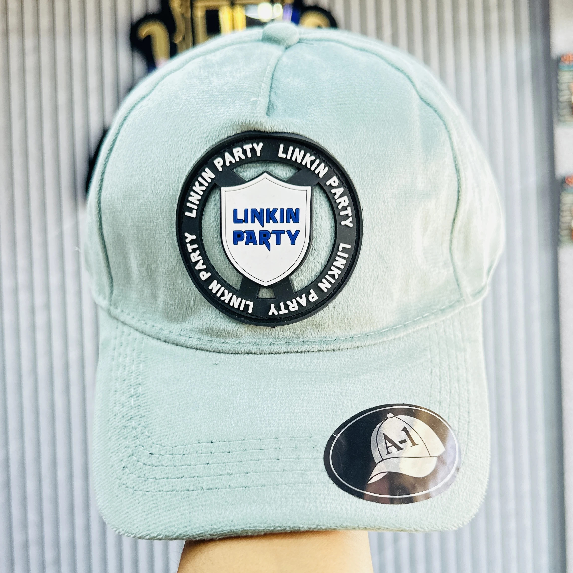 light blue Linkin Party branded baseball cap