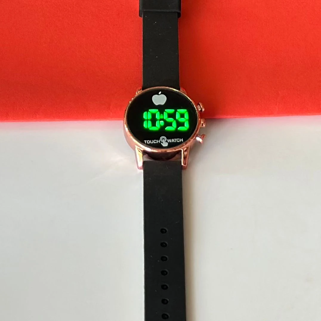 Black digital watch with a silicone strap
