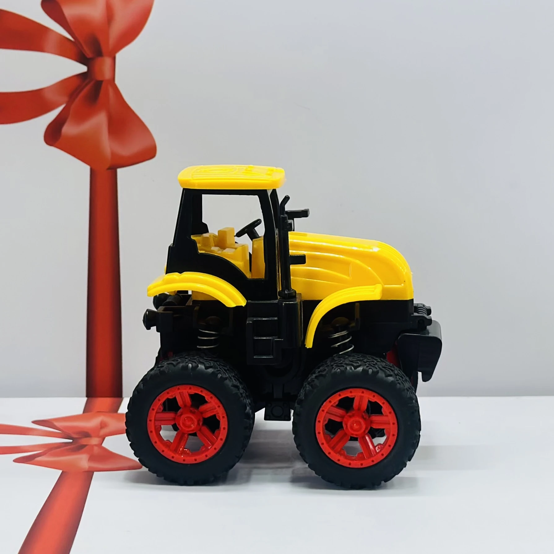 Yellow toy tractor