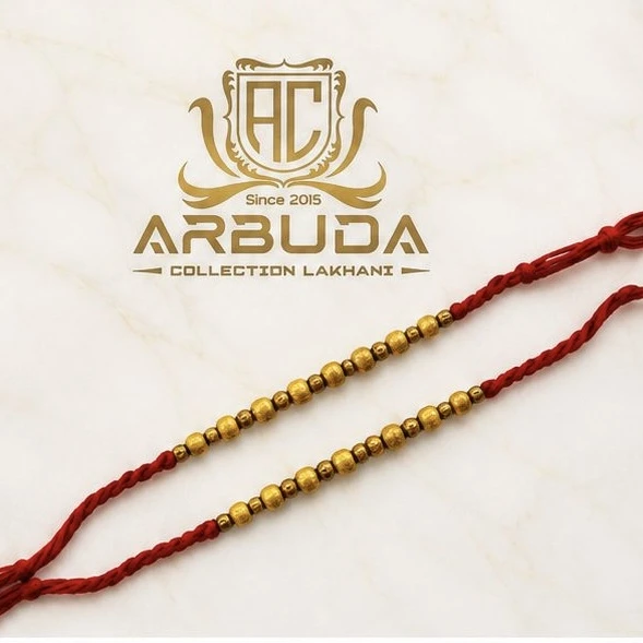 handcrafted red Rakhi featuring brass beads from Arbuda Collection Lakhani.