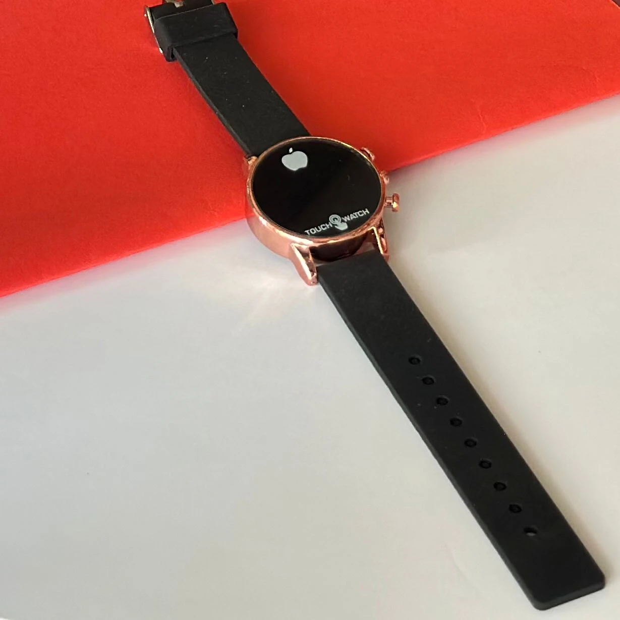 Black digital watch with a silicone strap