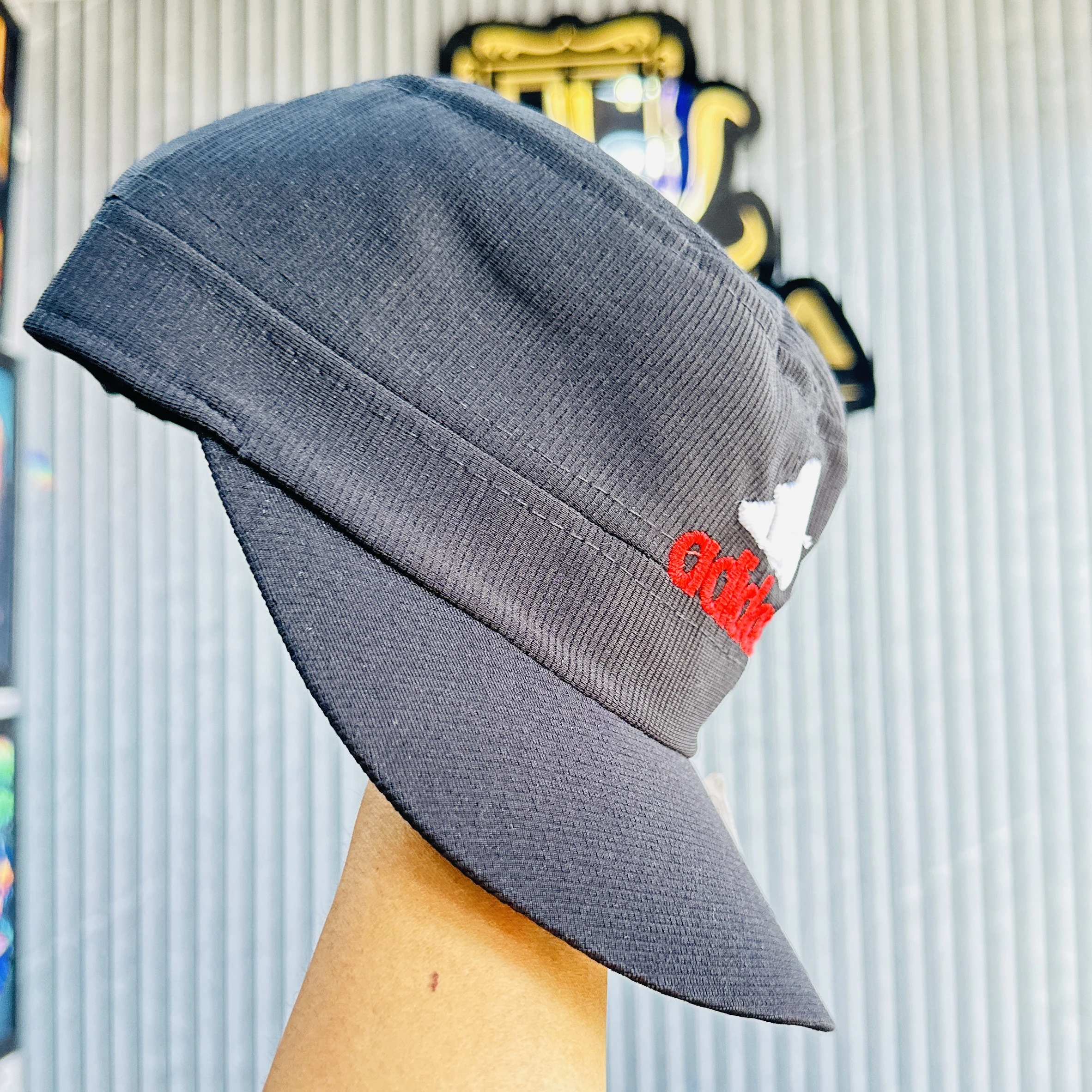 appears to be an Adidas brand sports cap