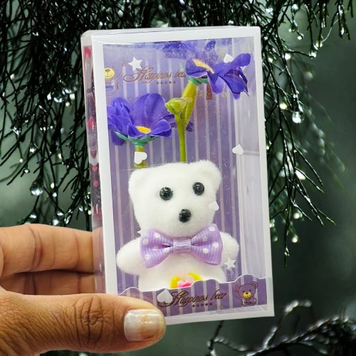 White teddy bear gift set with purple flowers